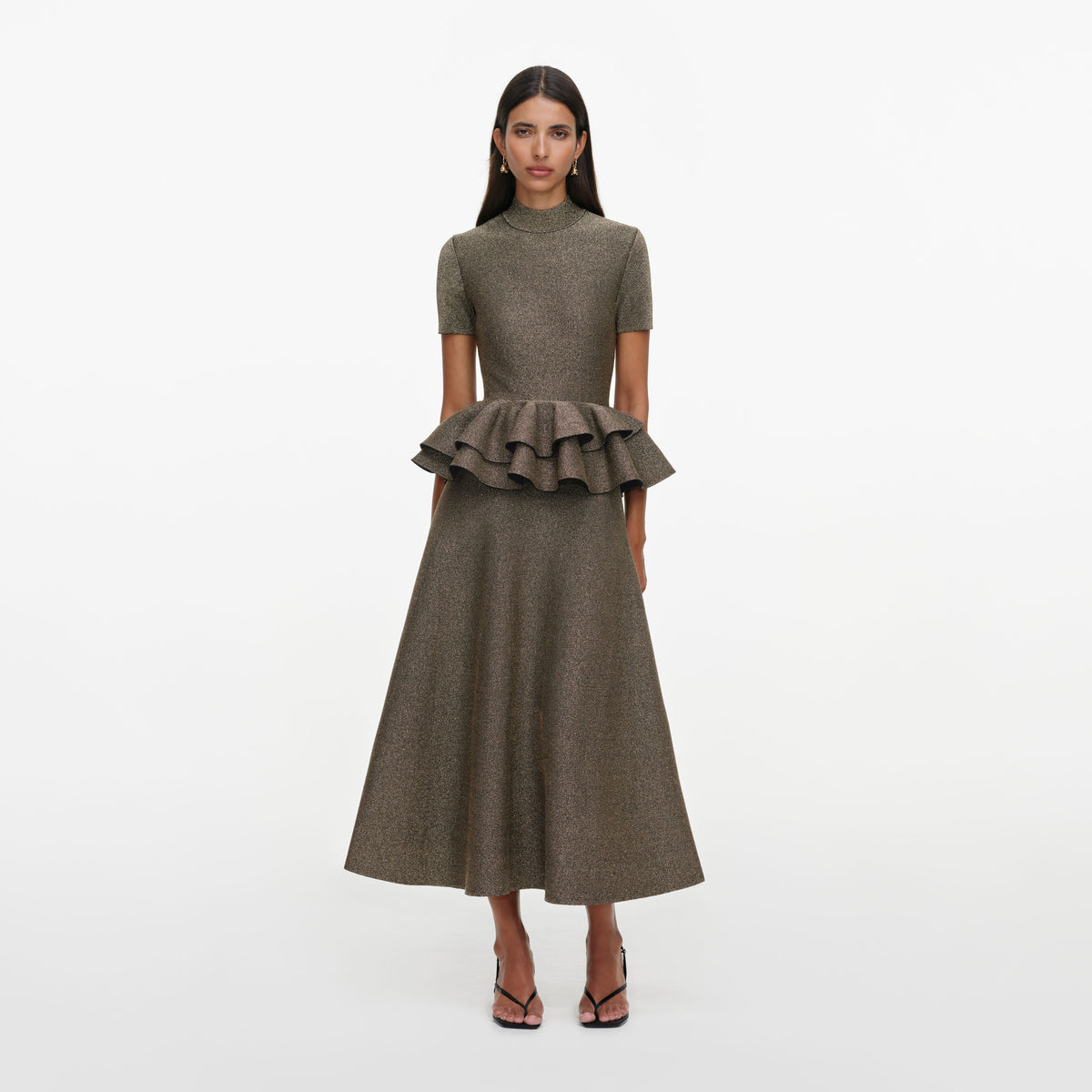 Front view of a woman wearing the Bronze Peplum Knit Midi Dress