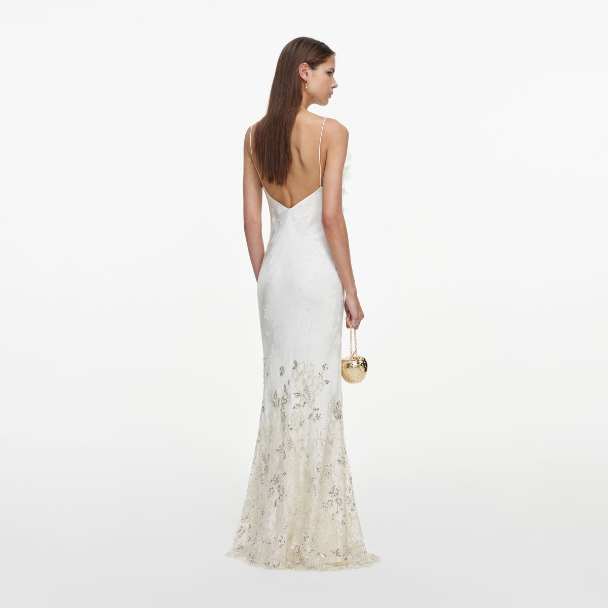 Back view of a woman wearing the Cream Embellished Floral Maxi Dress