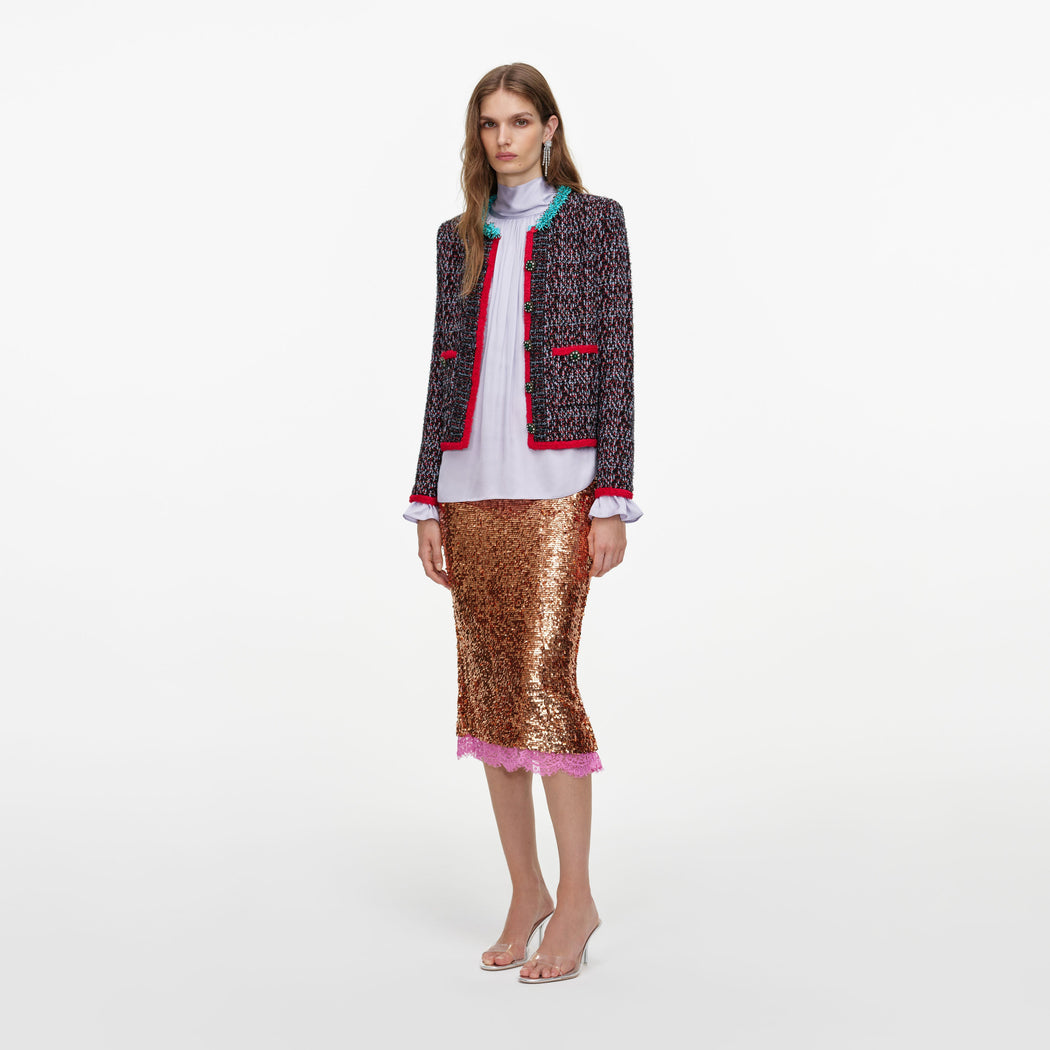 Side view of a woman wearing the Multi Textured Knit Cardigan