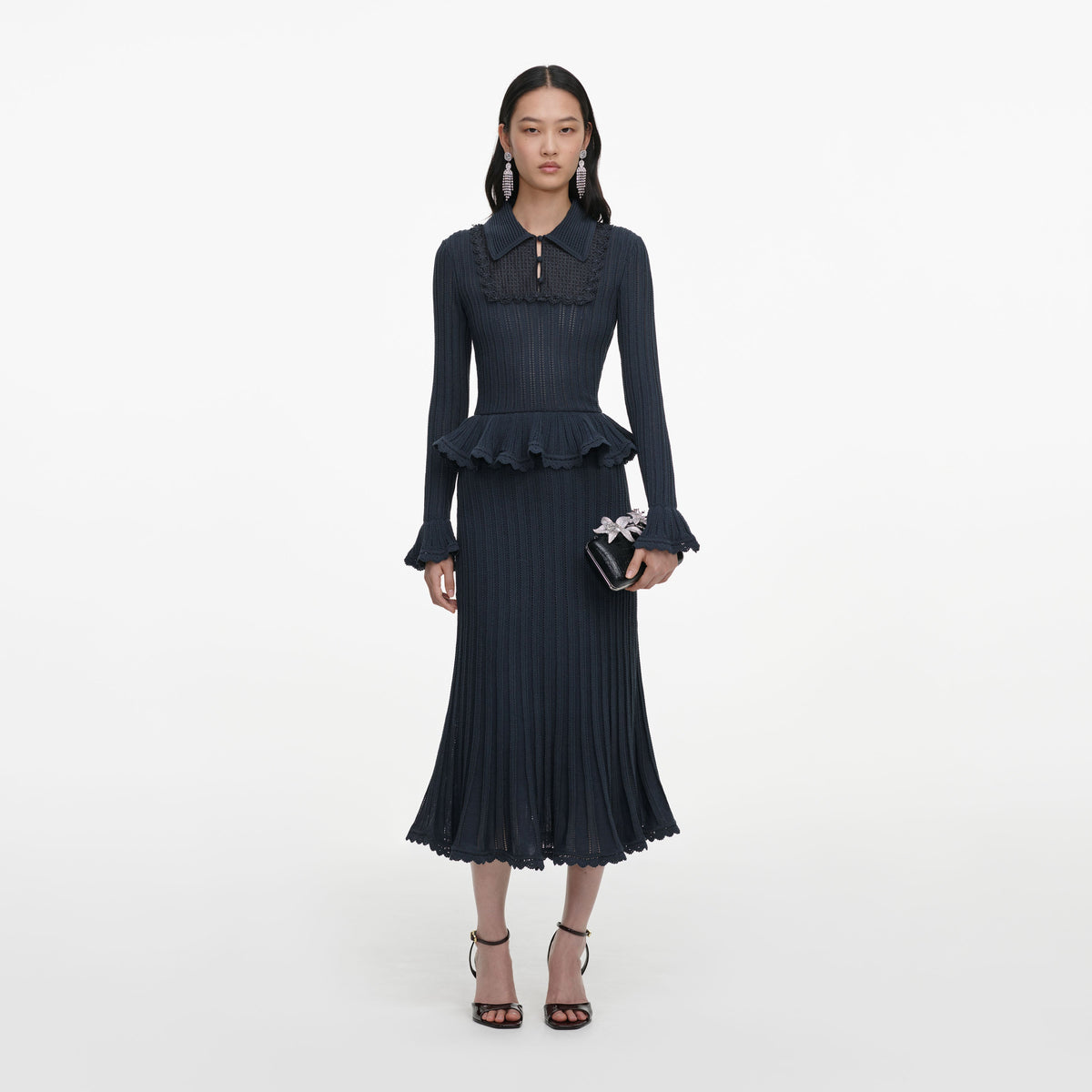 Front view of a woman wearing the Grey Peplum Pointelle Knit Midi Dress
