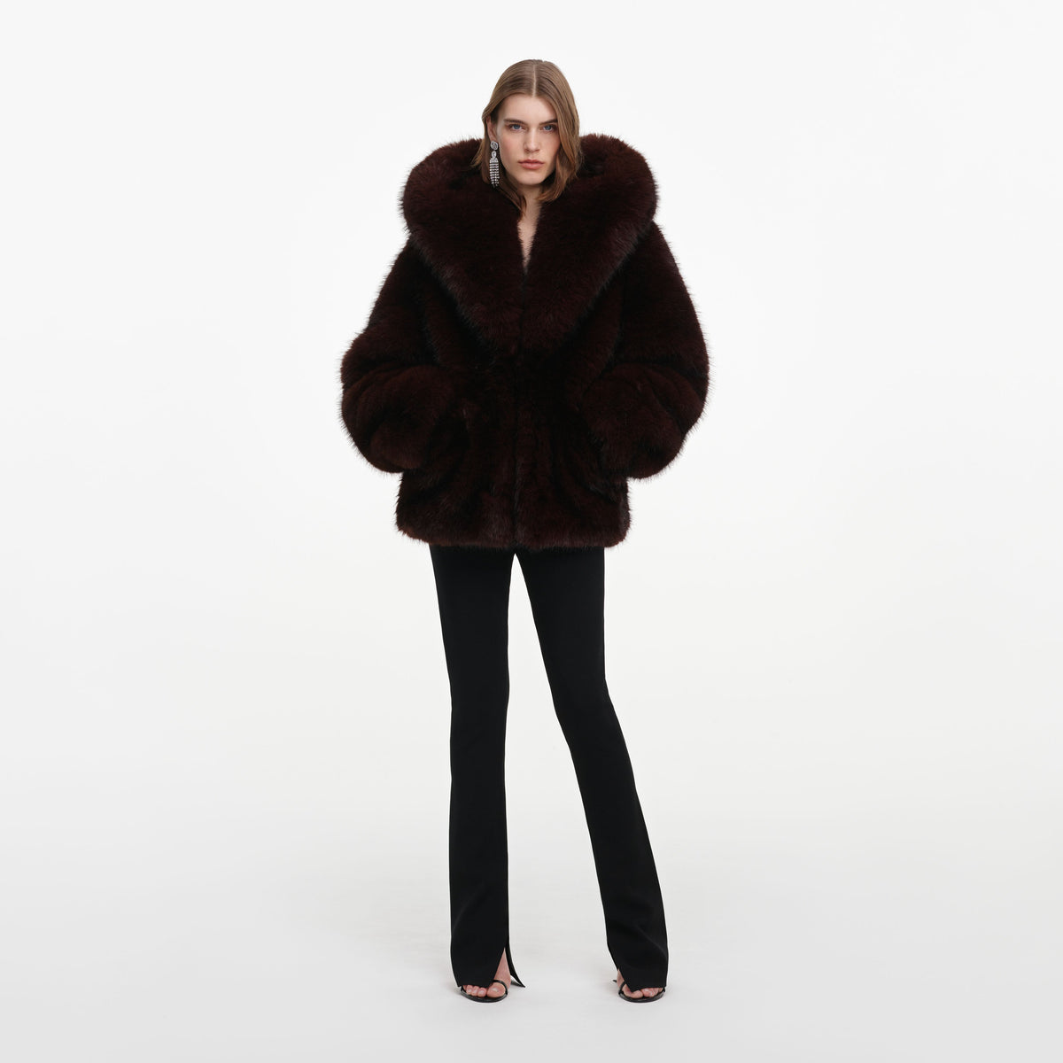 Front view of a woman wearing the Brown Faux Fur Hooded Jacket