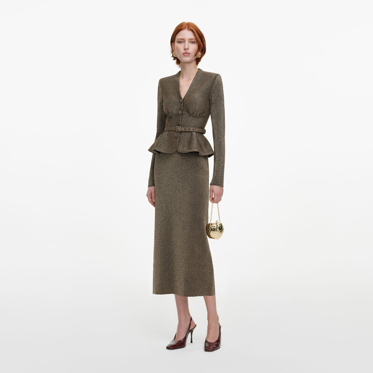 Side view of a woman wearing the Bronze Tailored Knit Midi Dress