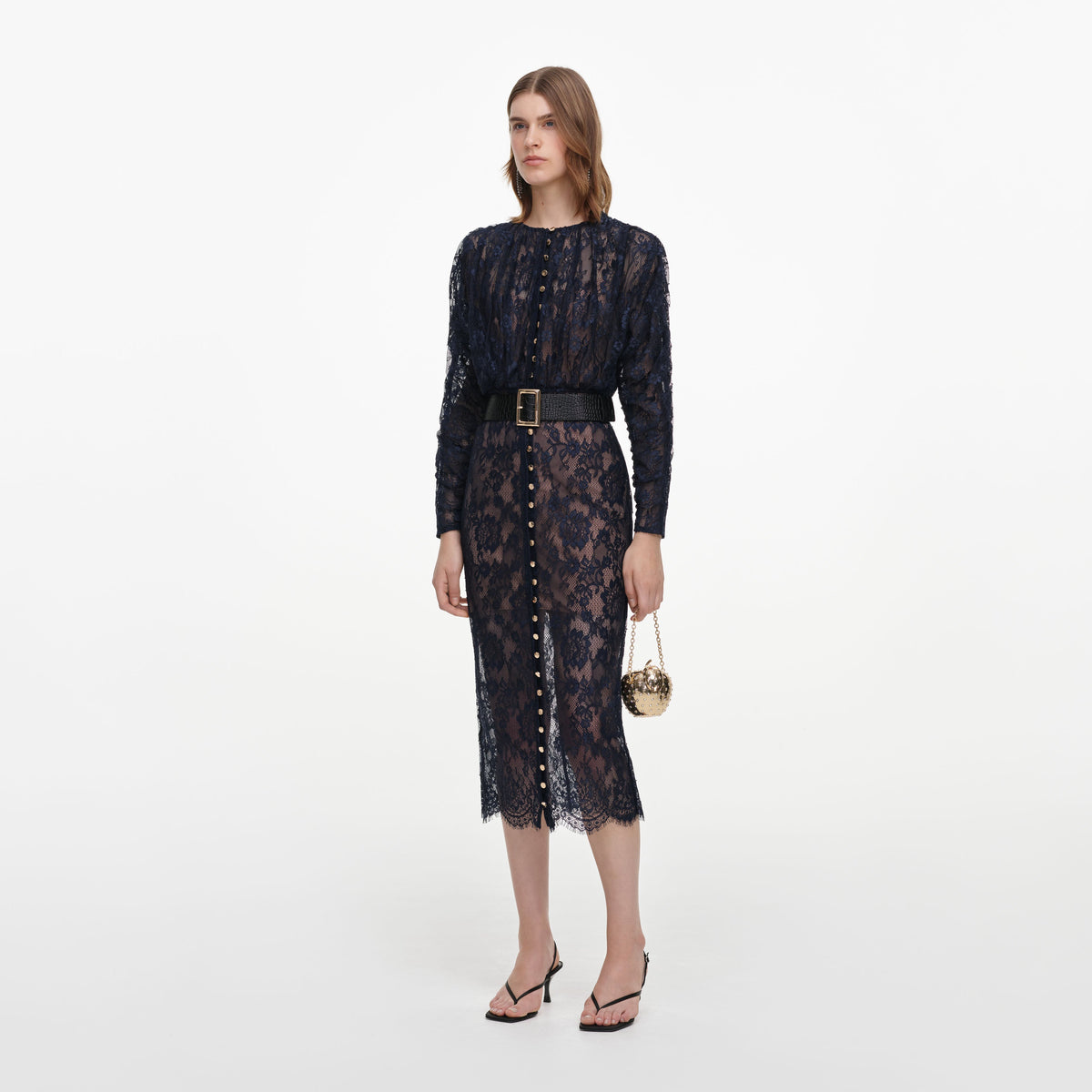 Side view of a woman wearing the Navy Lace Button Midi Dress