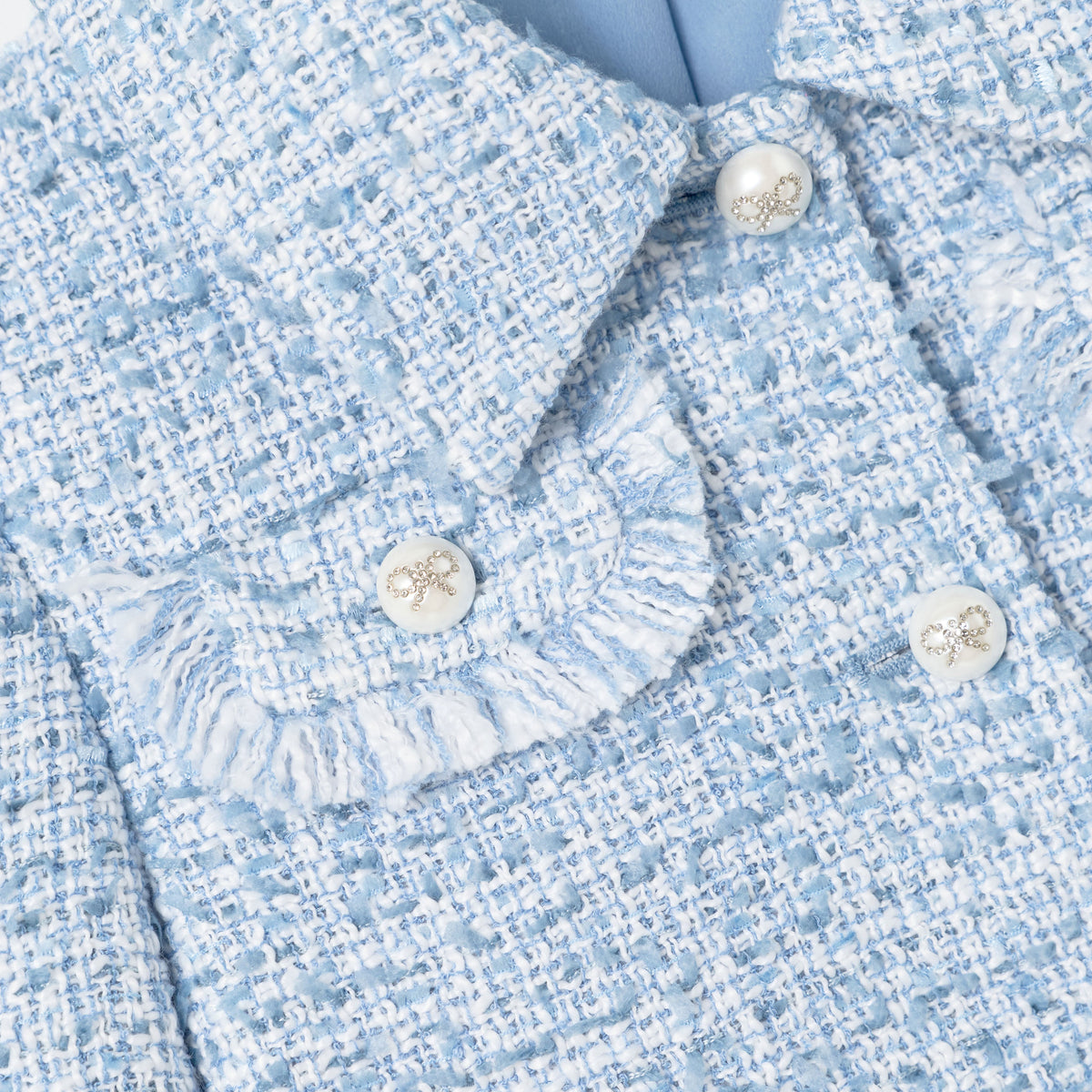 Detail Shot of the Blue Textured Boucle Jacket