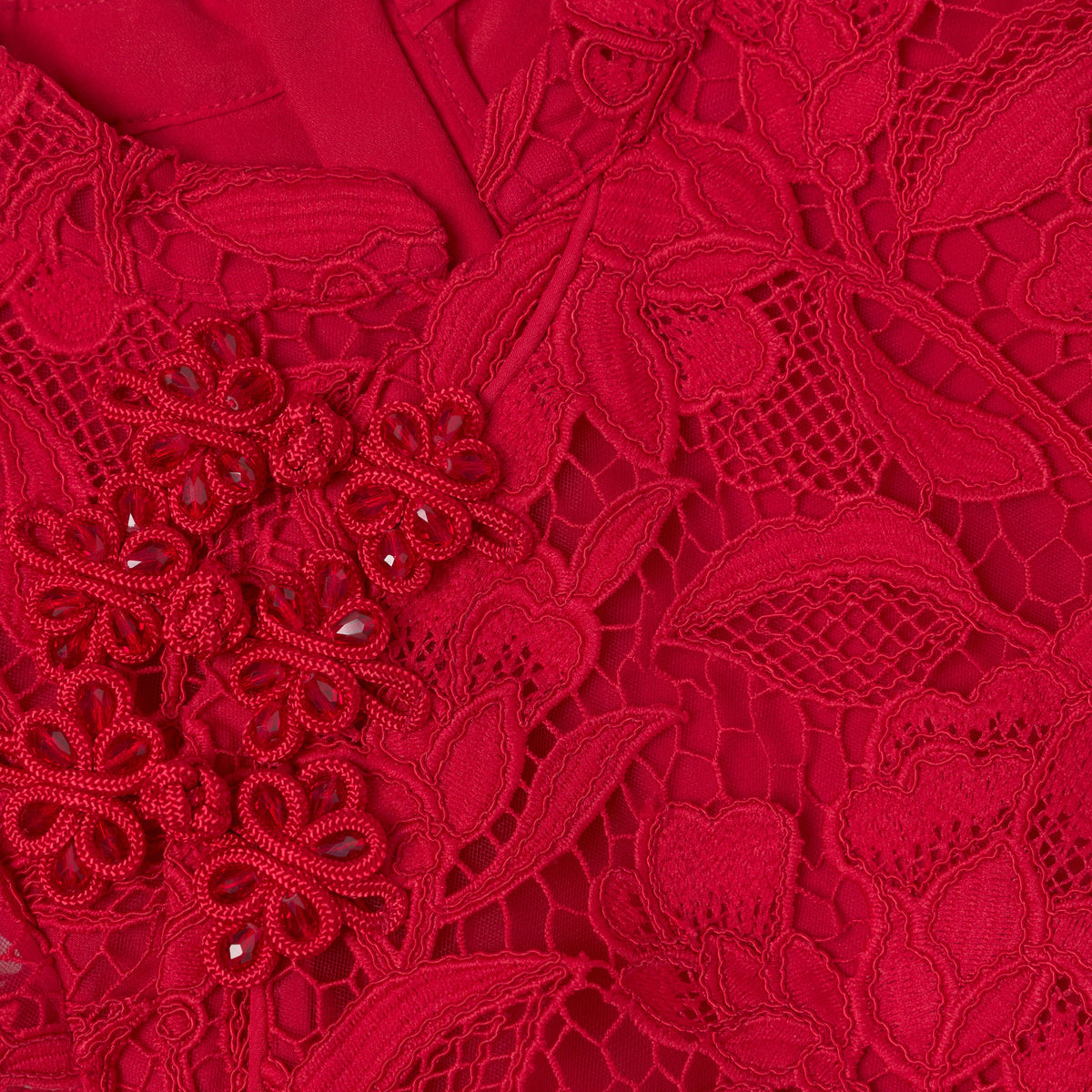 Detail Shot of the Red Lace Flower Dress