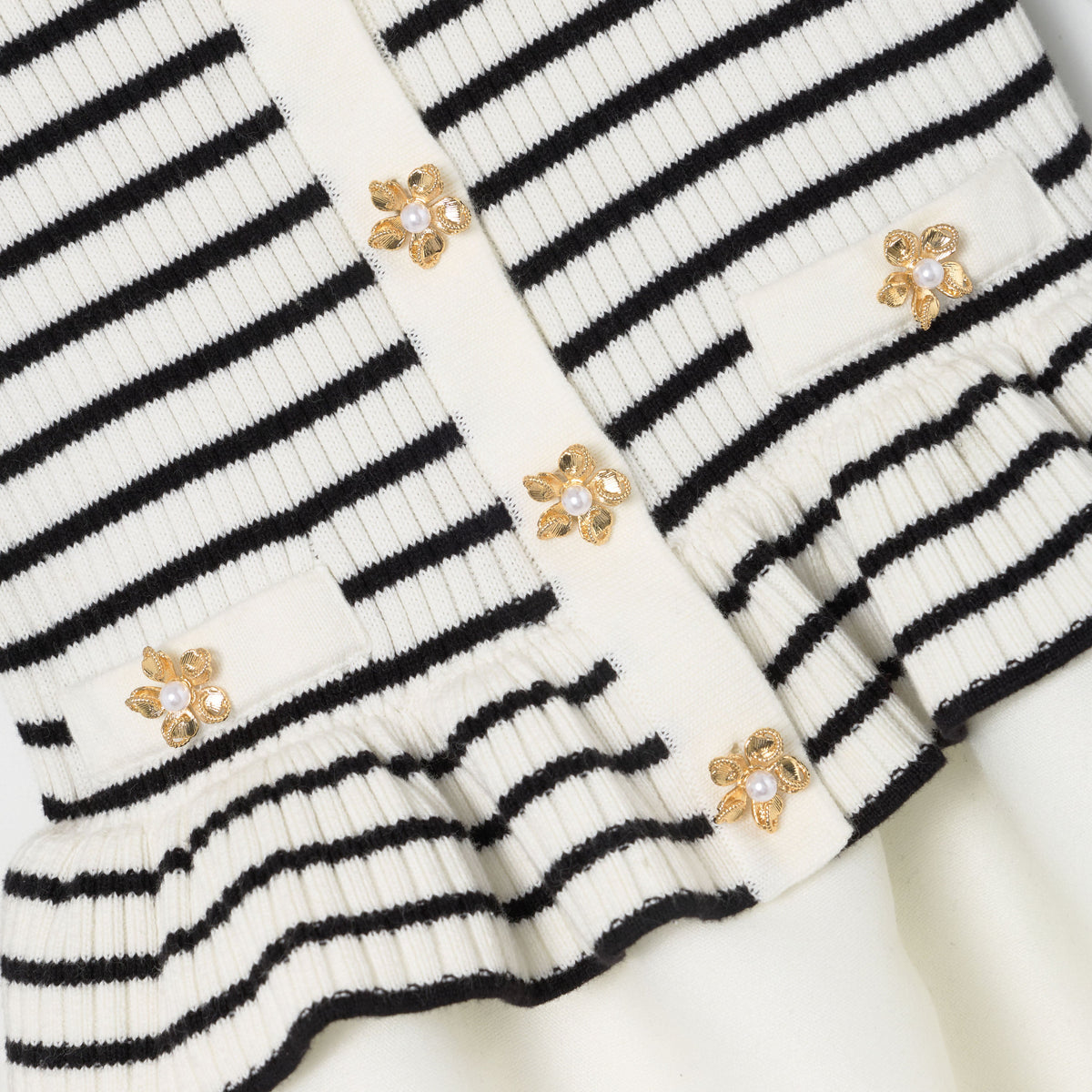 Detail Shot of the Cream Striped Ribbed Knit Mini Dress