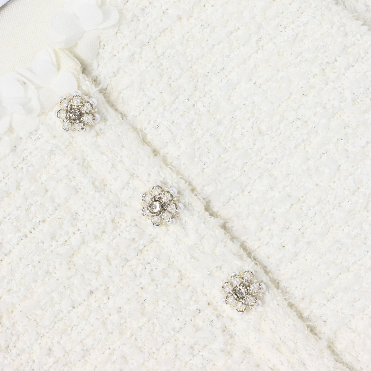 Detail Shot of the White Textured Knit Dress