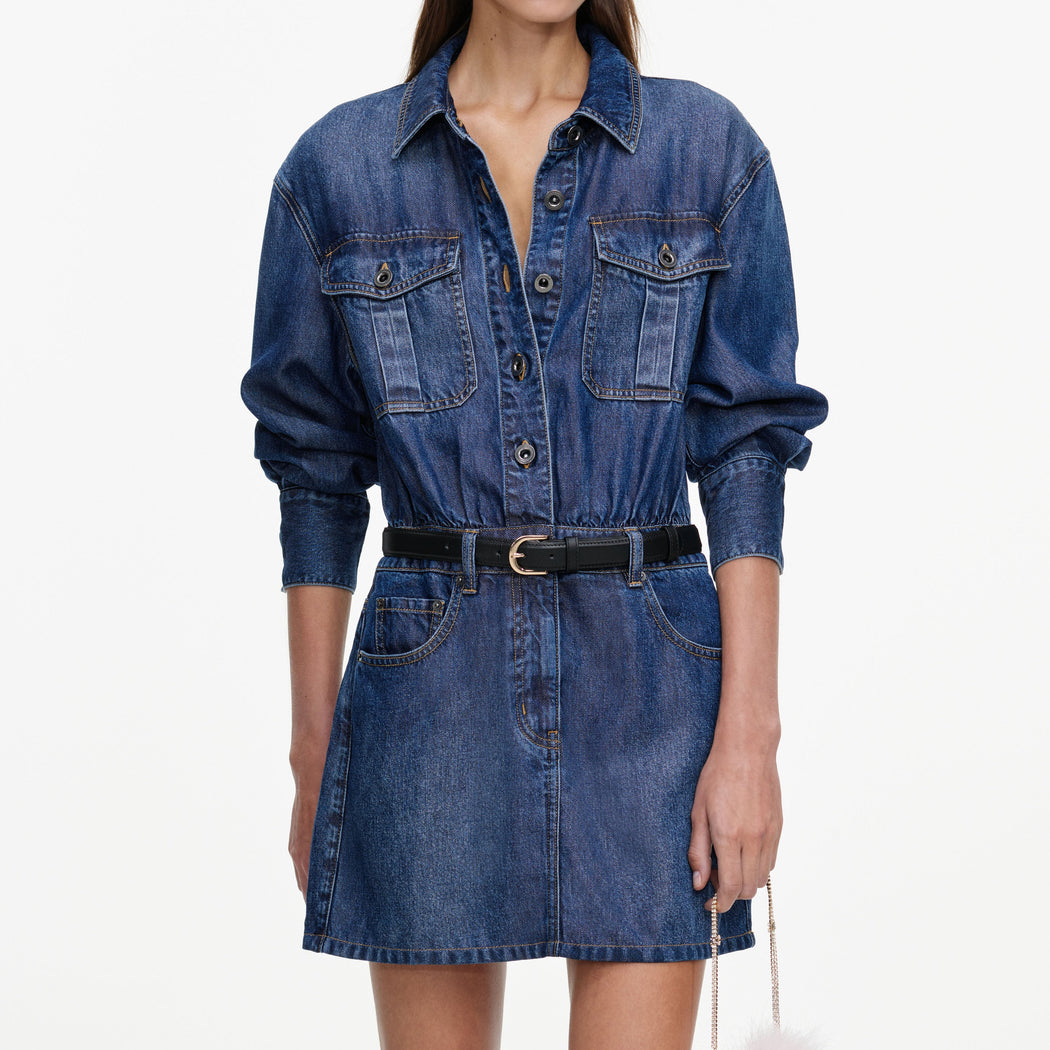 A close up of a woman wearing the Lightweight Denim Mini Dress