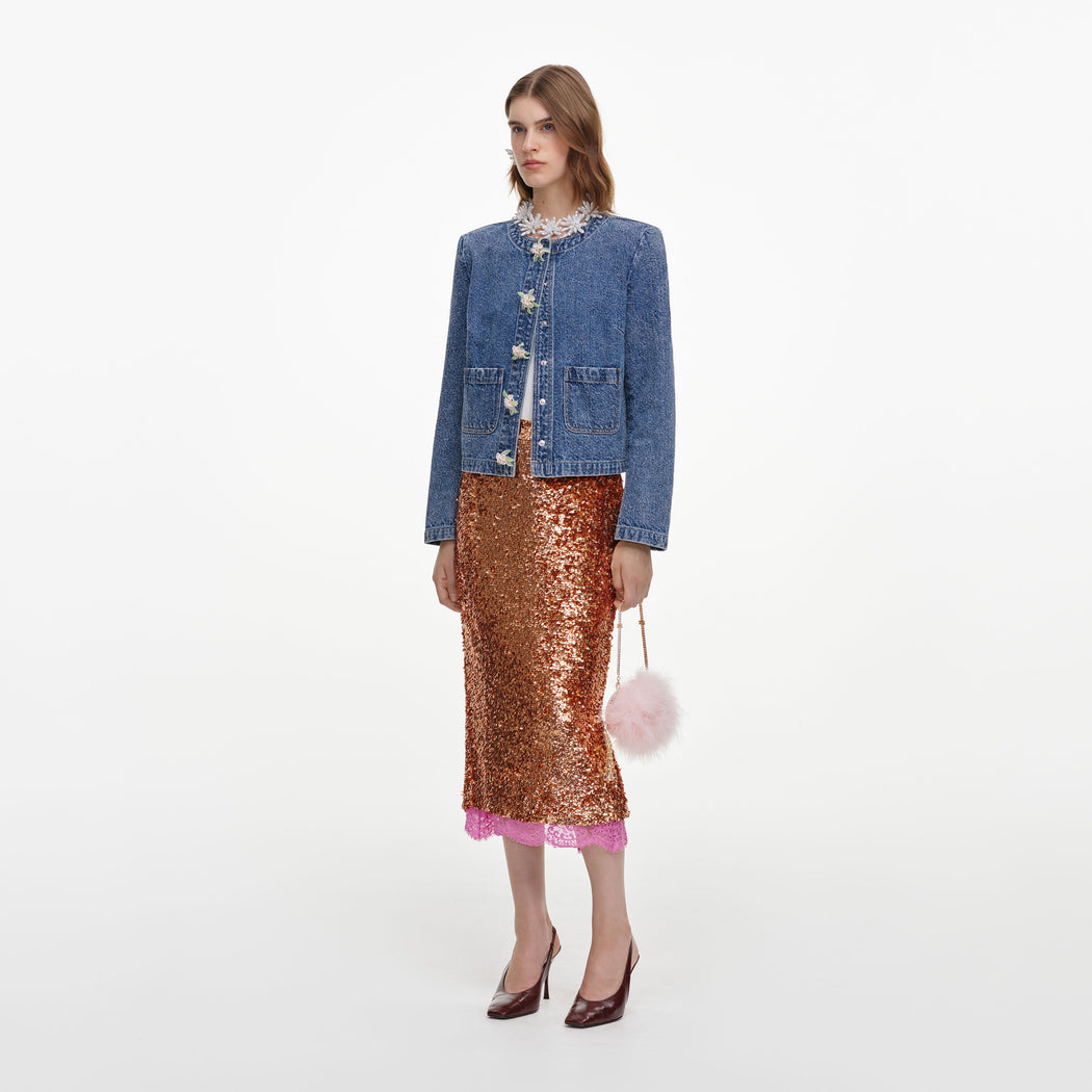 Side view of a woman wearing the Textured Denim Jacket
