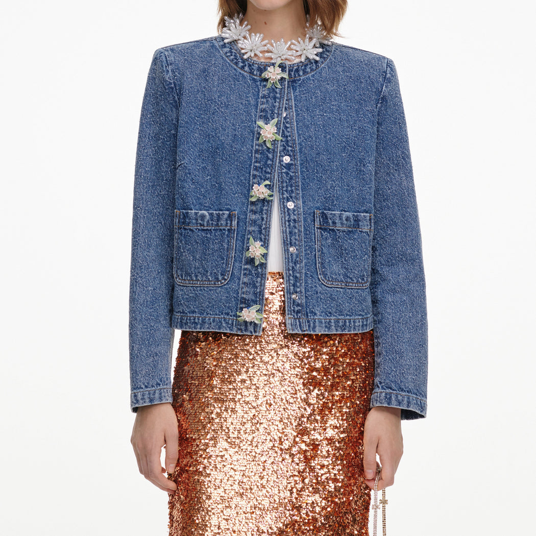 A close up of a woman wearing the Textured Denim Jacket