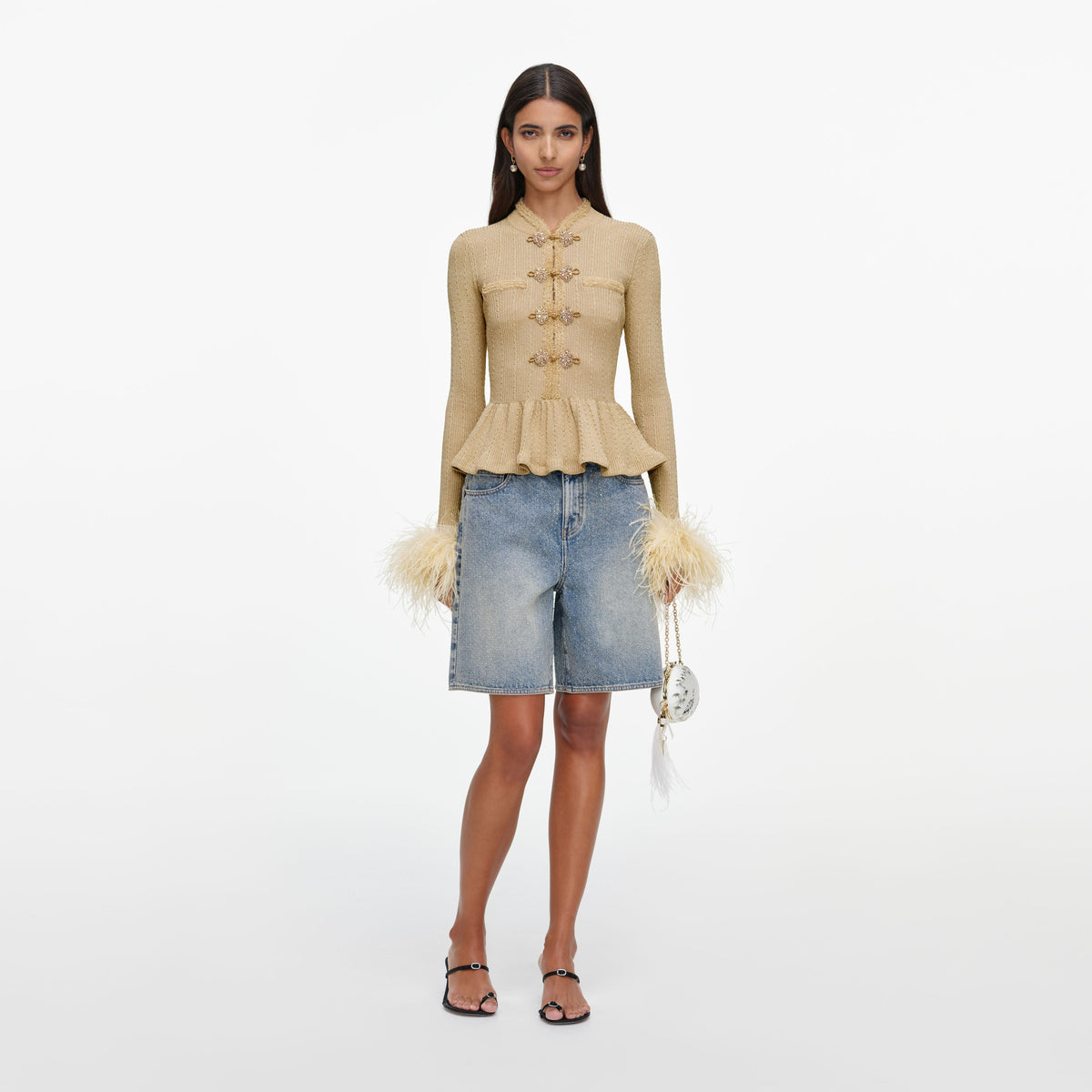 Front view of a woman wearing the Gold Metallic Feather Knit Top