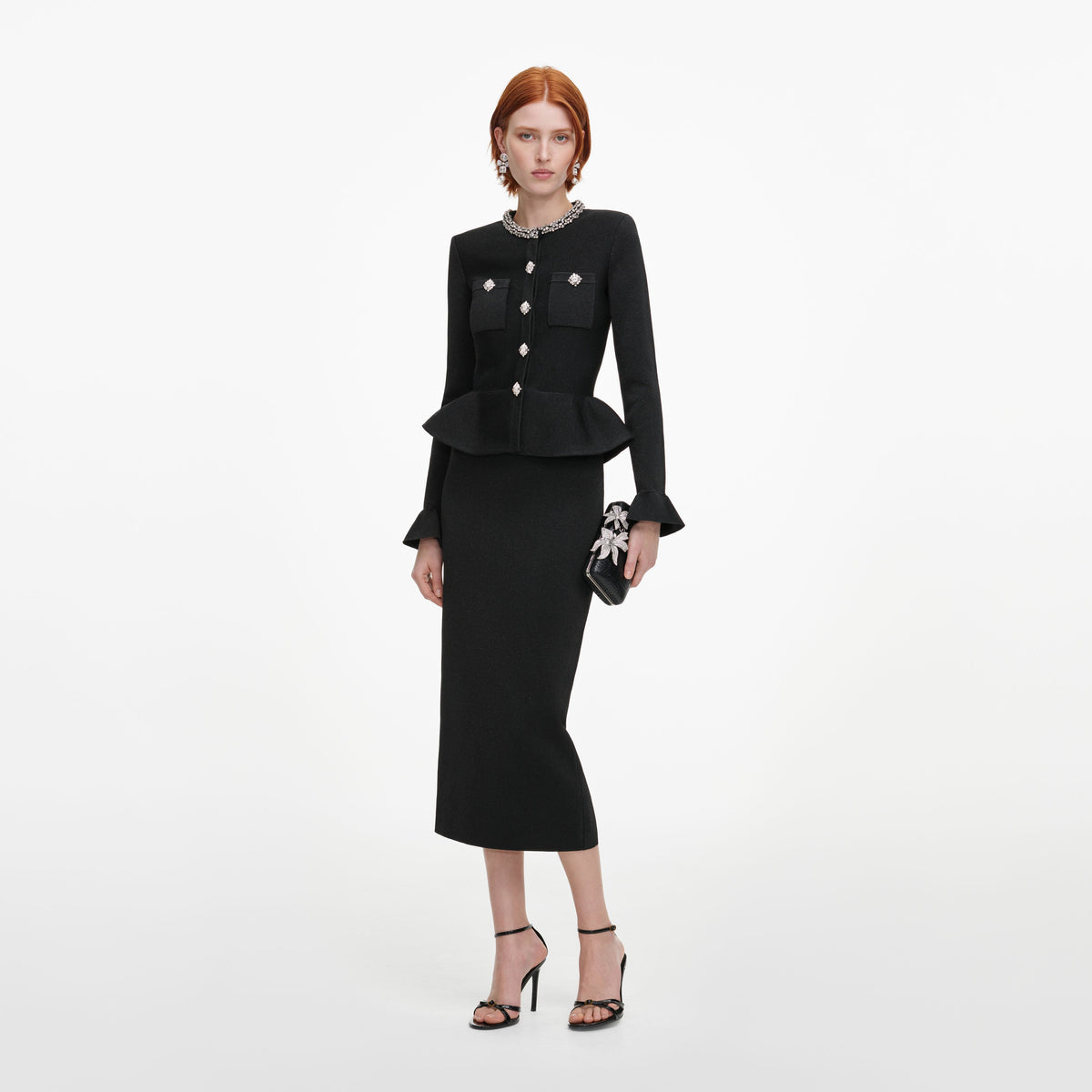 Side view of a woman wearing the Black Crystal Trim Knit Midi Dress
