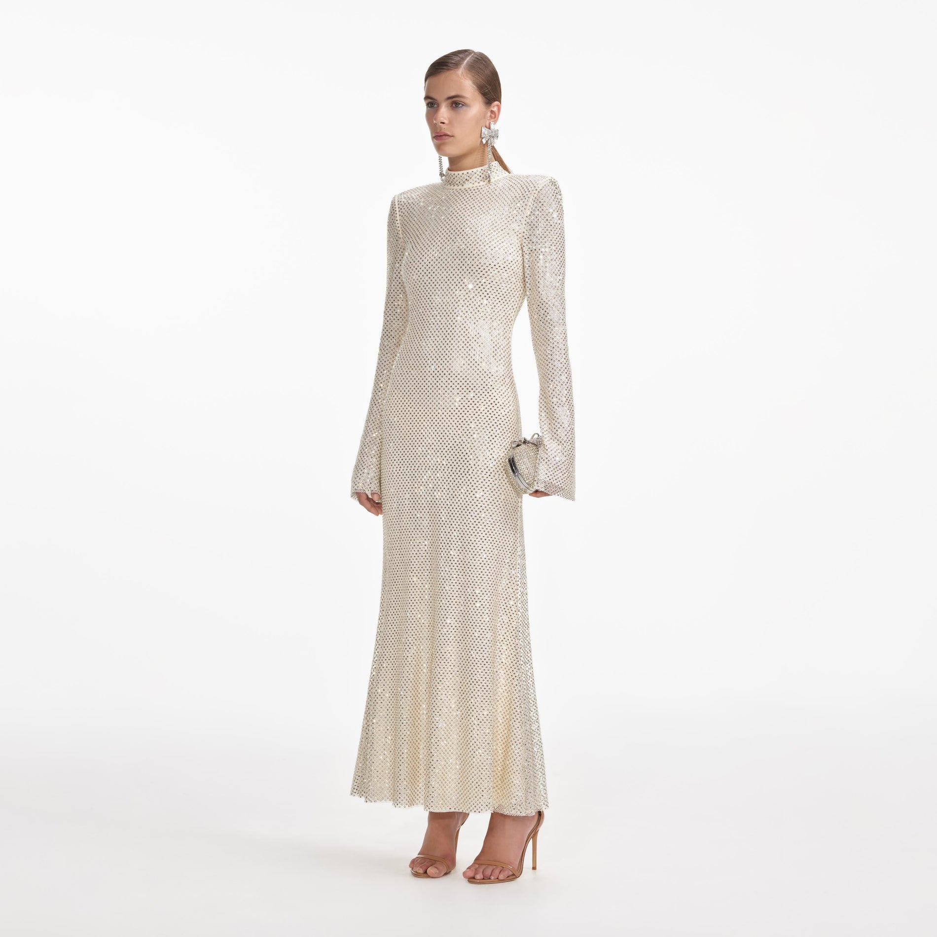 Side view of a woman wearing the Cream Square Rhinestone Fishnet Midi Dress