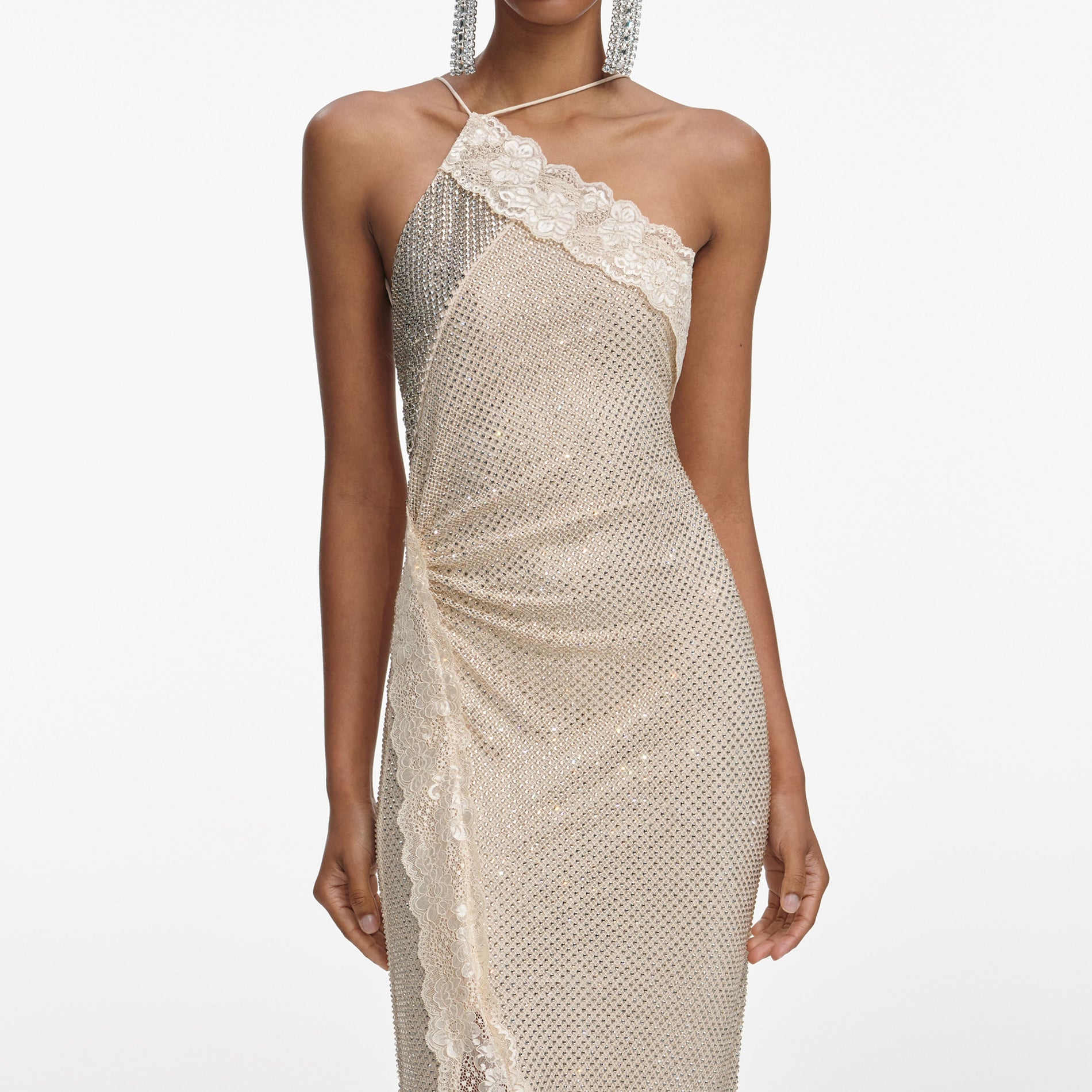 A close up of a woman wearing the Champagne Rhinestone Lace Trim Maxi Dress