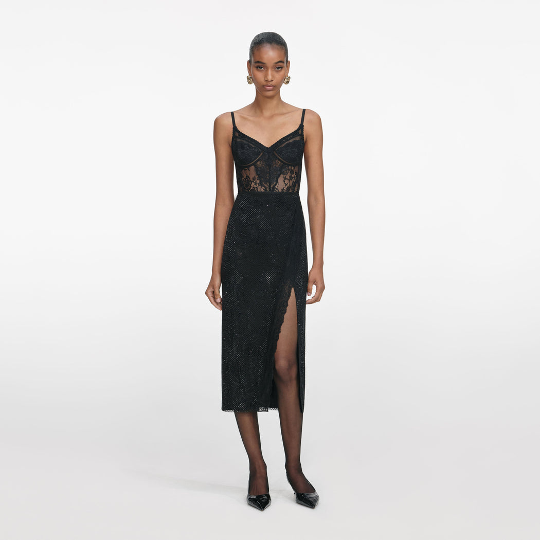 Front view of a woman wearing the Black Rhinestone Midi Skirt