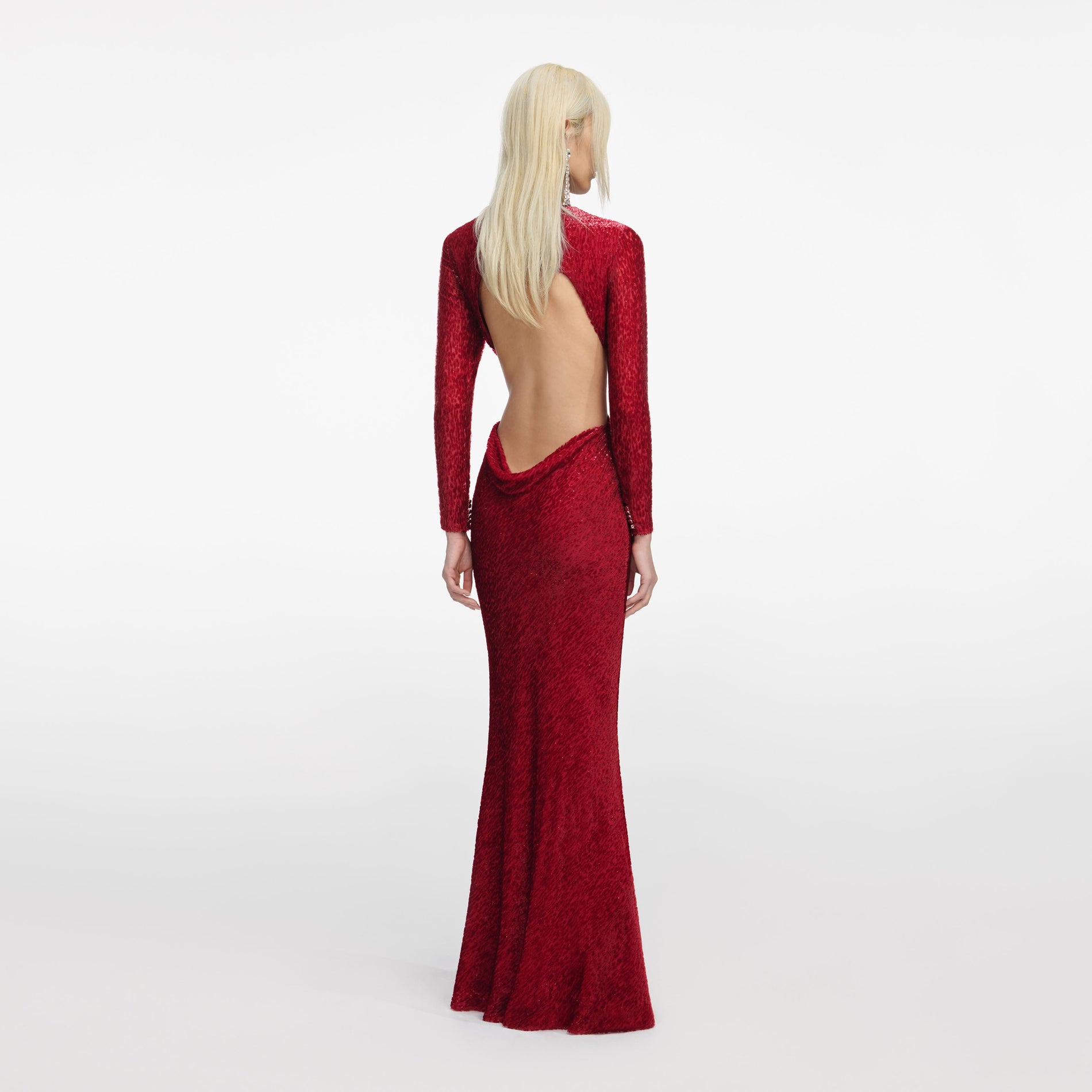 Back view of a woman wearing the Red Fil Coupe Maxi Dress