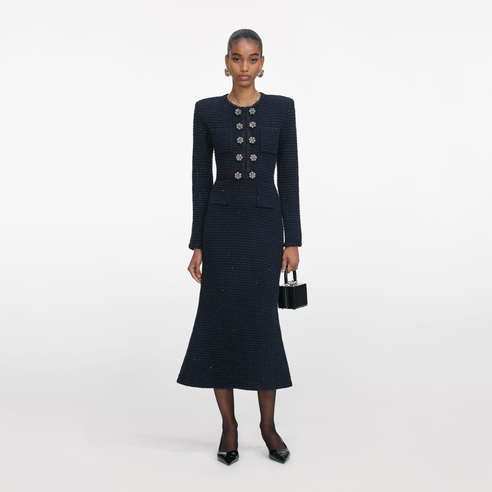 Front view of a woman wearing the Navy Textured Knit Midi Dress