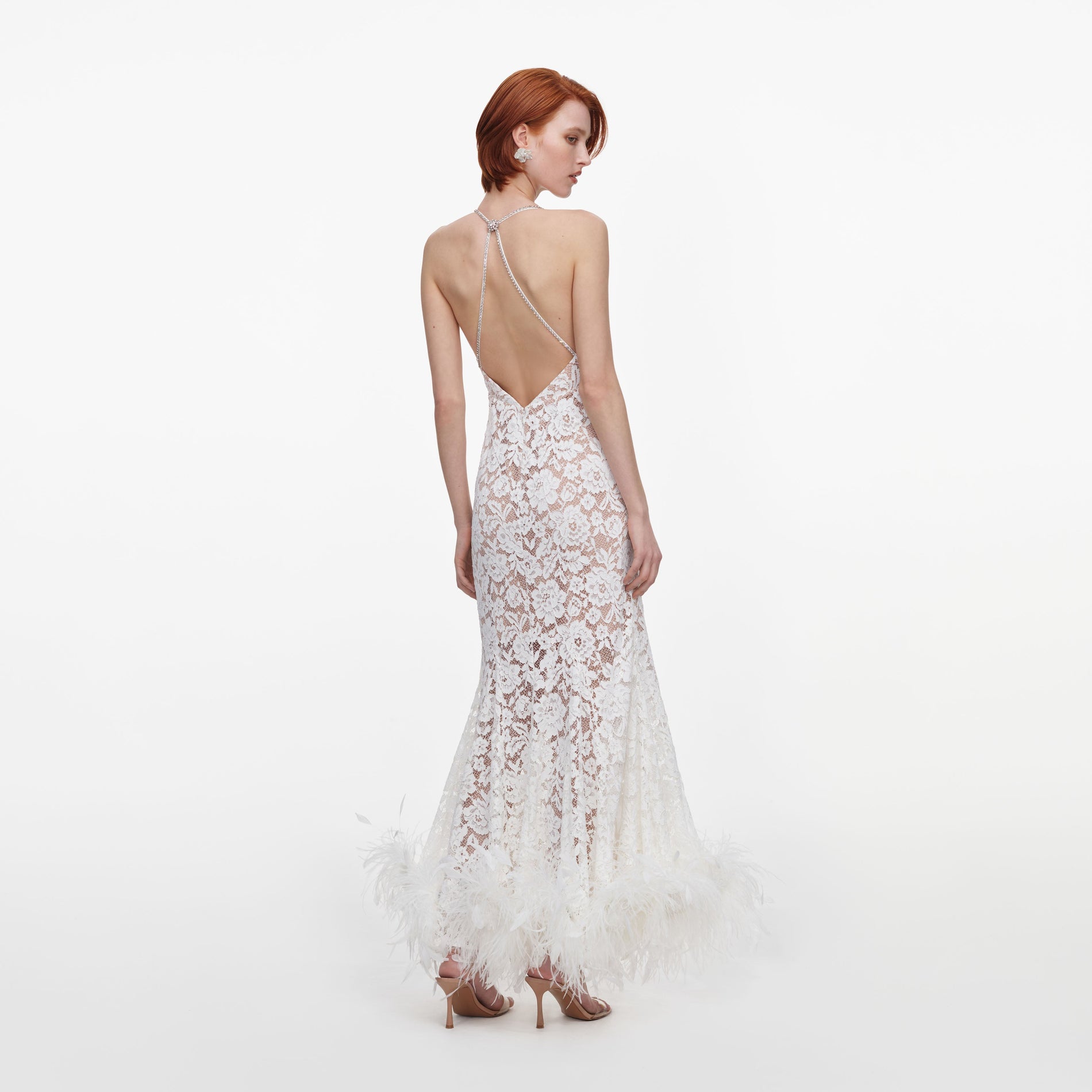 Back view of a woman wearing the White Fine Lace Feather Maxi Dress