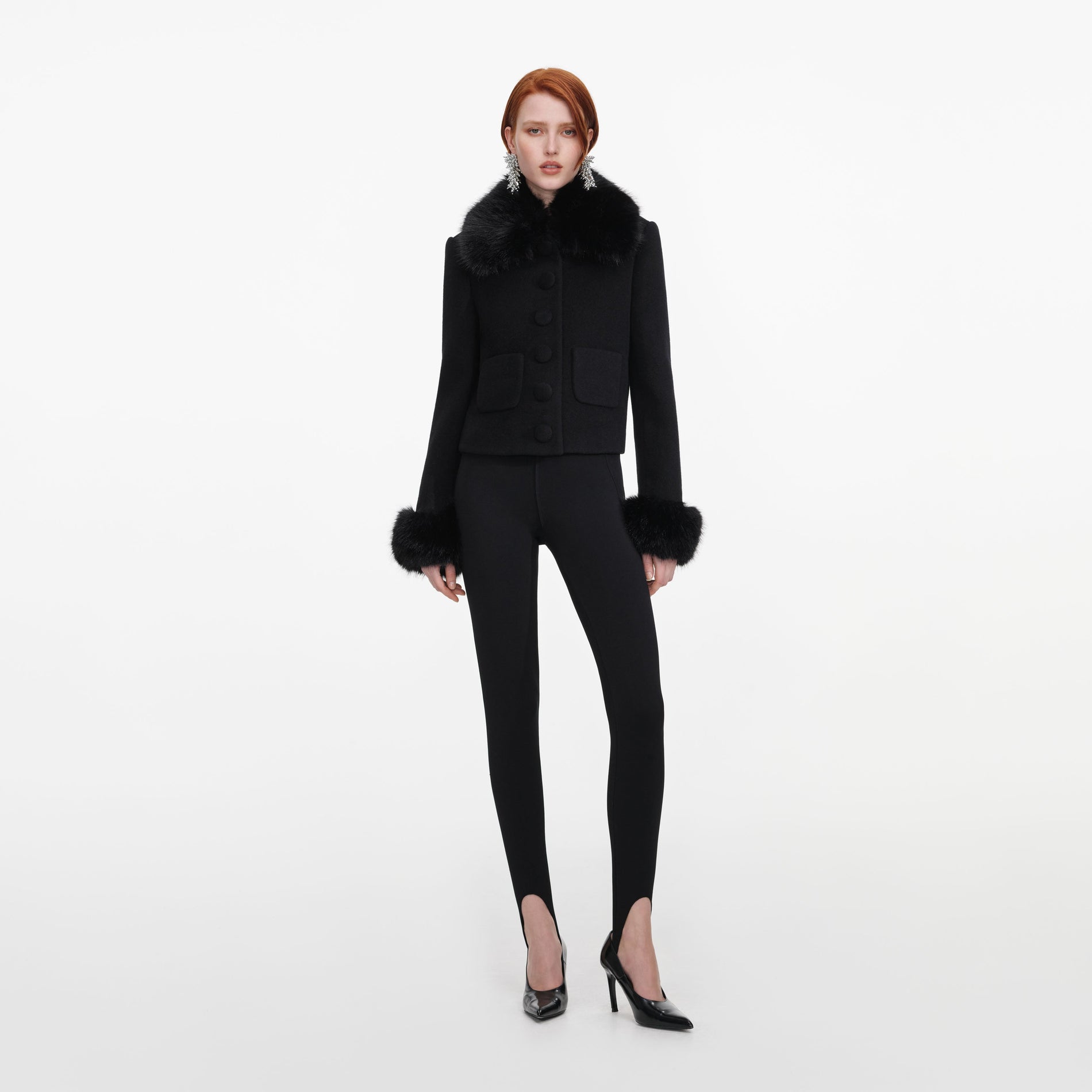 Front view of a woman wearing the Black Wool Fur Cuff Jacket