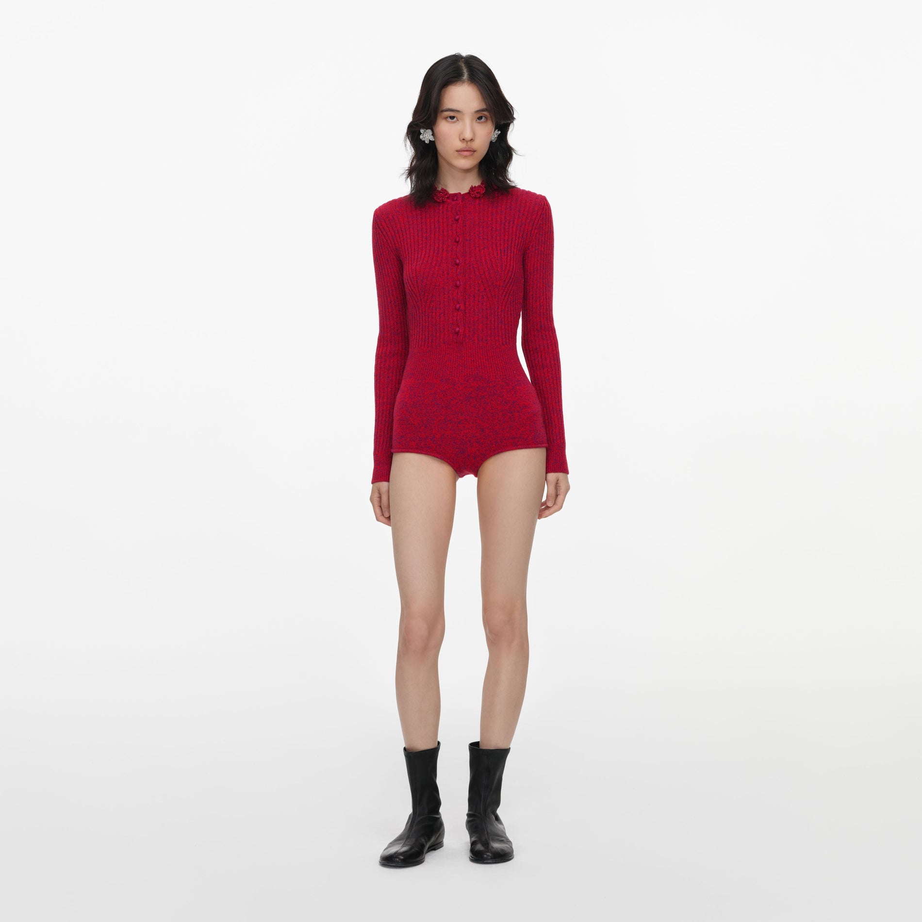 Front view of a woman wearing the Red Flower Knit Playsuit