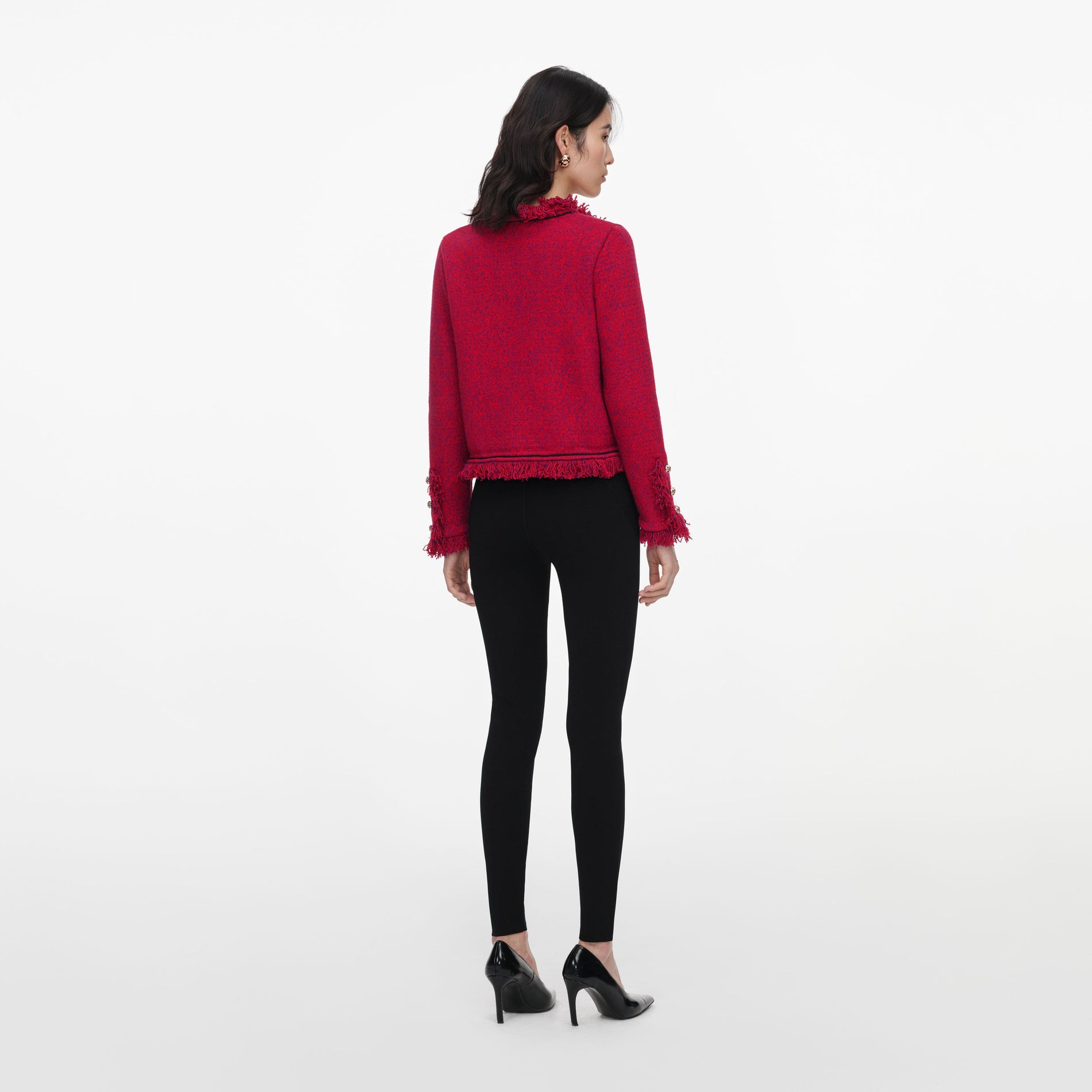 Back view of a woman wearing the Red Frayed Knit Jacket