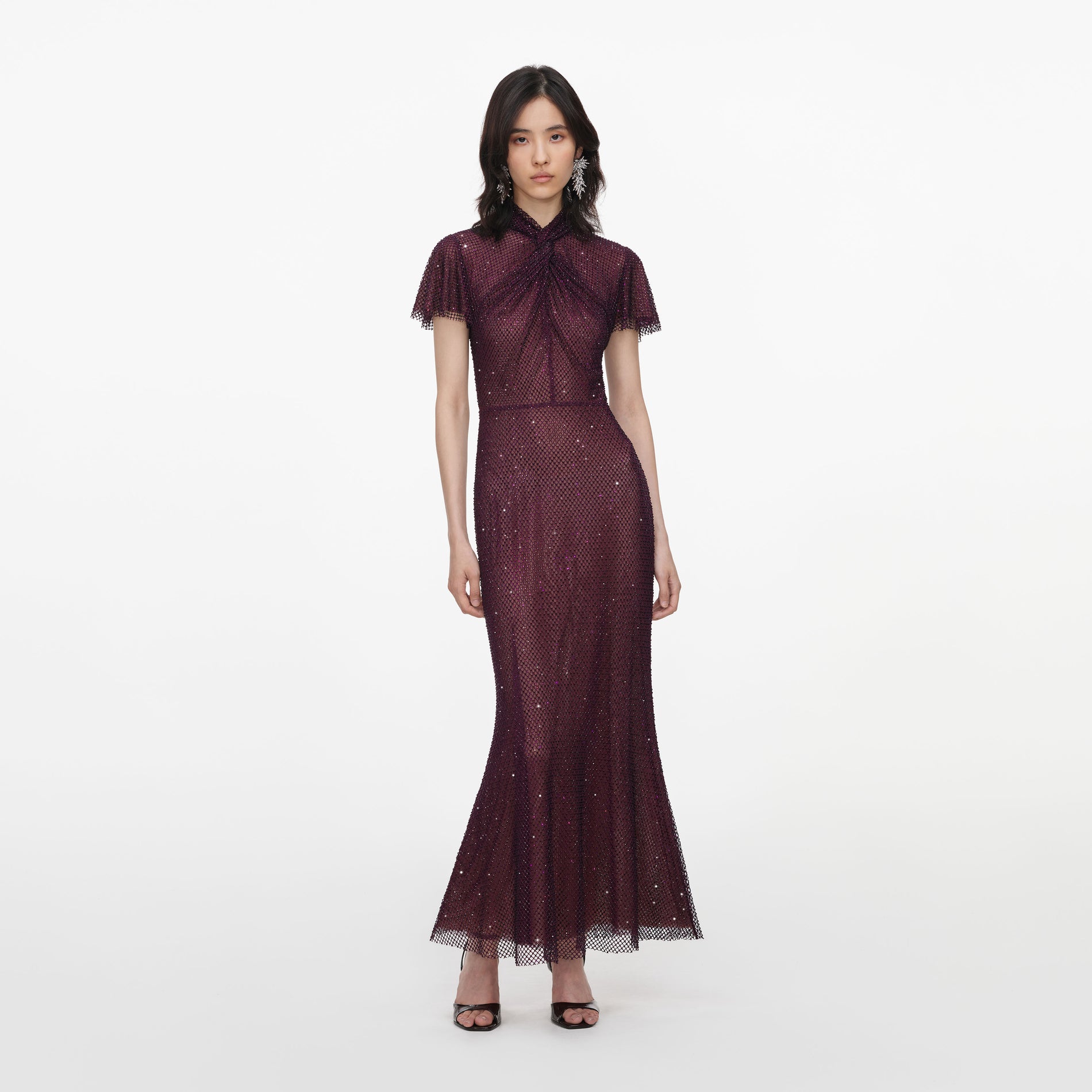 Front view of a woman wearing the Burgundy Rhinestone Fishnet Midi Dress