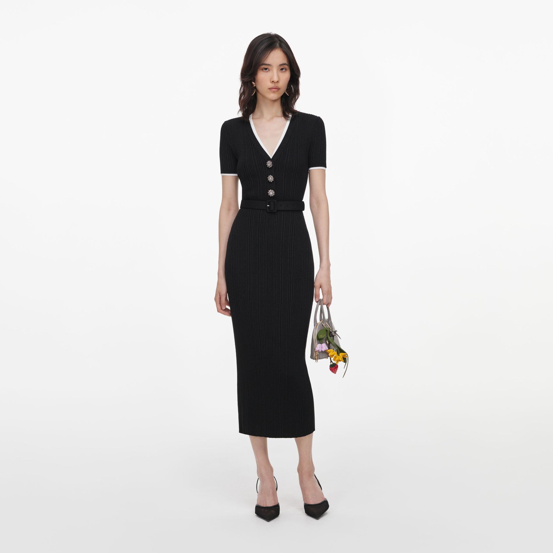 Front view of a woman wearing the Black Rib Knit Midi Dress