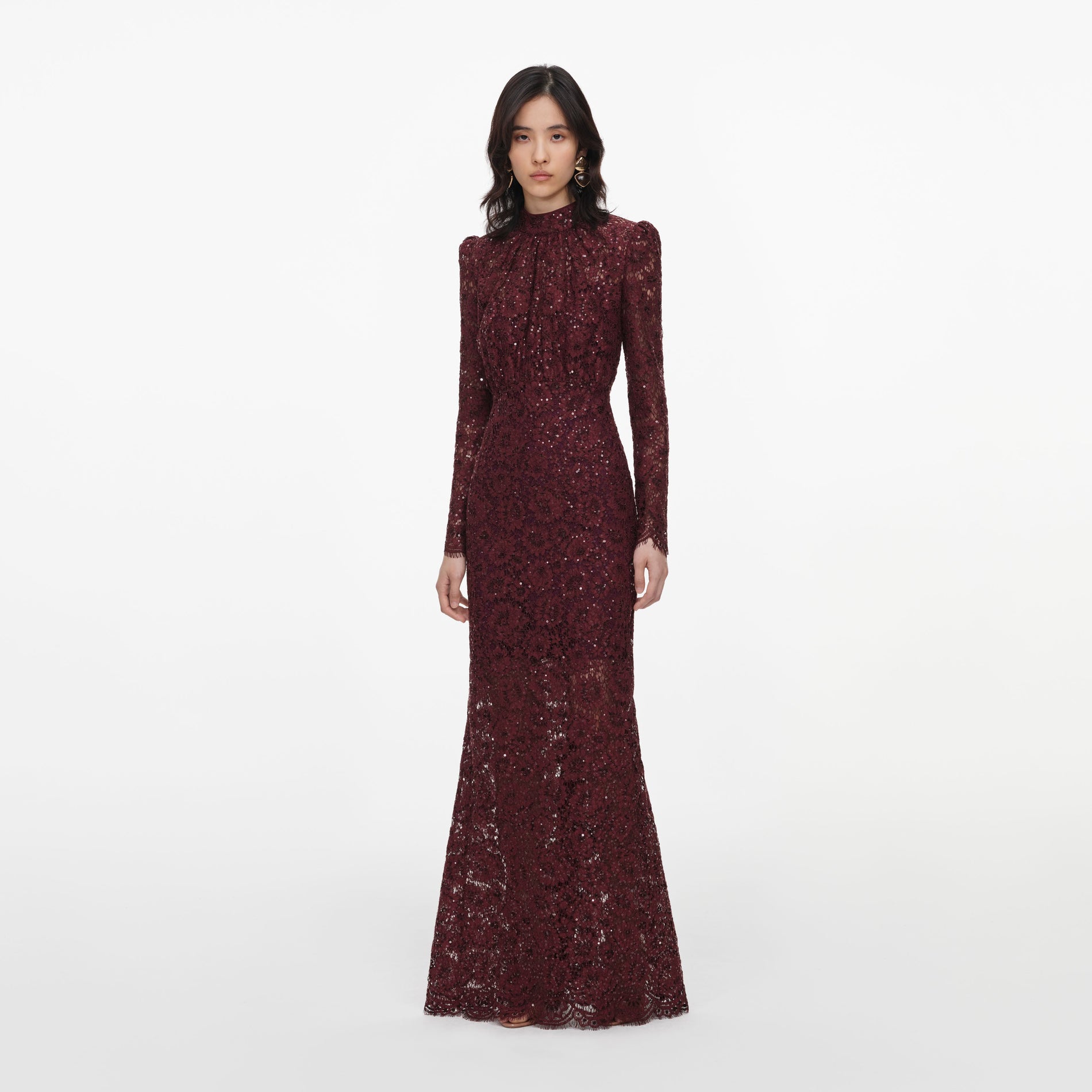 Side view of a woman wearing the Burgundy Sequin Lace Maxi Dress