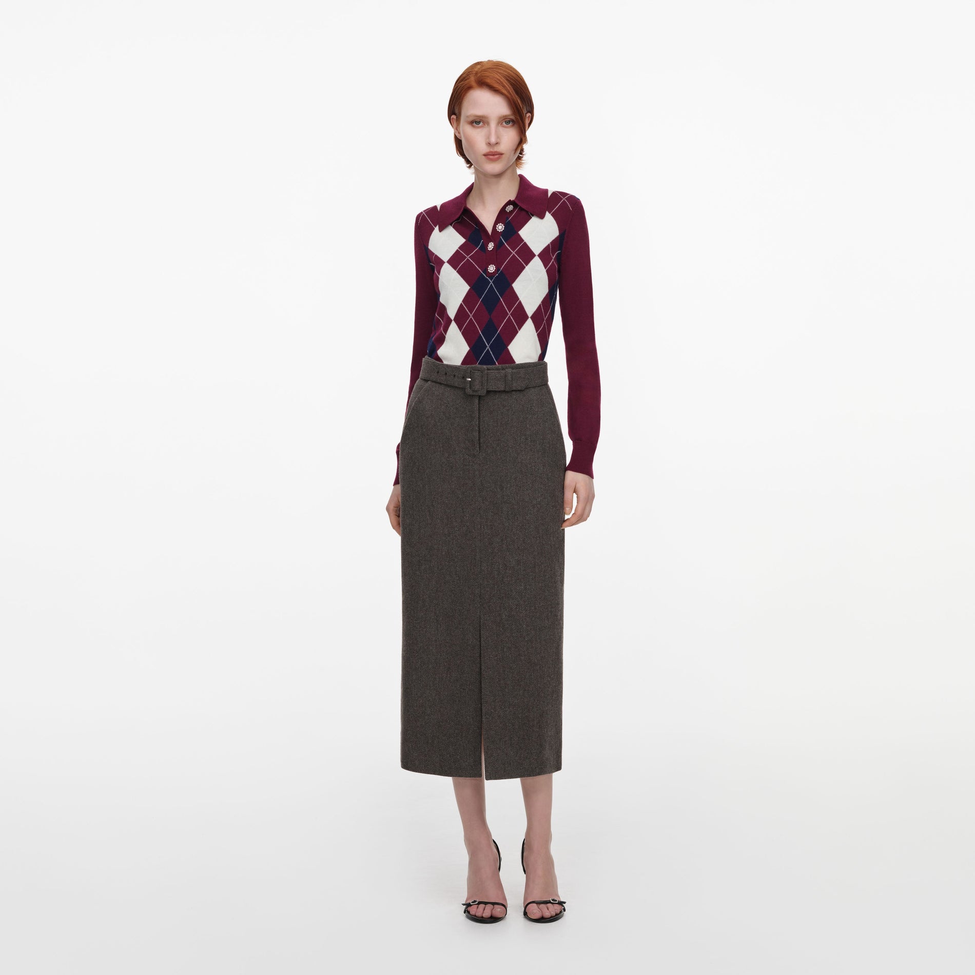 Front view of a woman wearing the Burgundy Argyle Lightweight Jumper