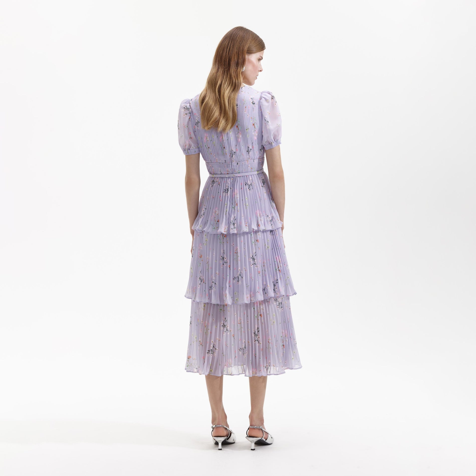 Back view of a woman wearing the Lilac Floral Midi Dress