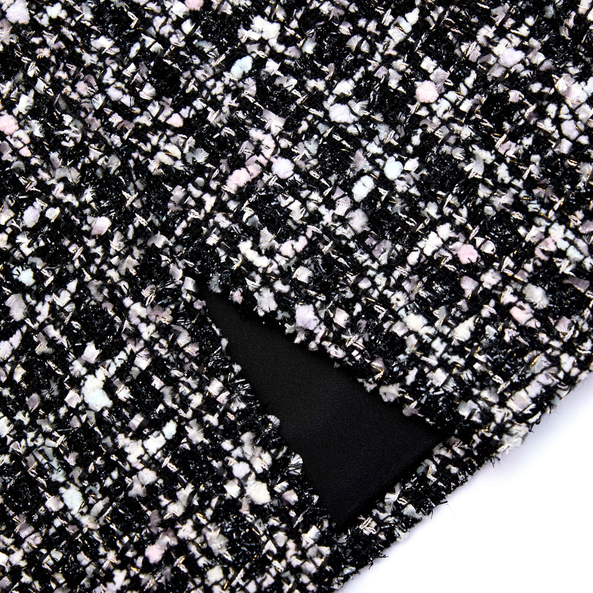A close up of the fabric for the Black Check Boucle Mini Skirt