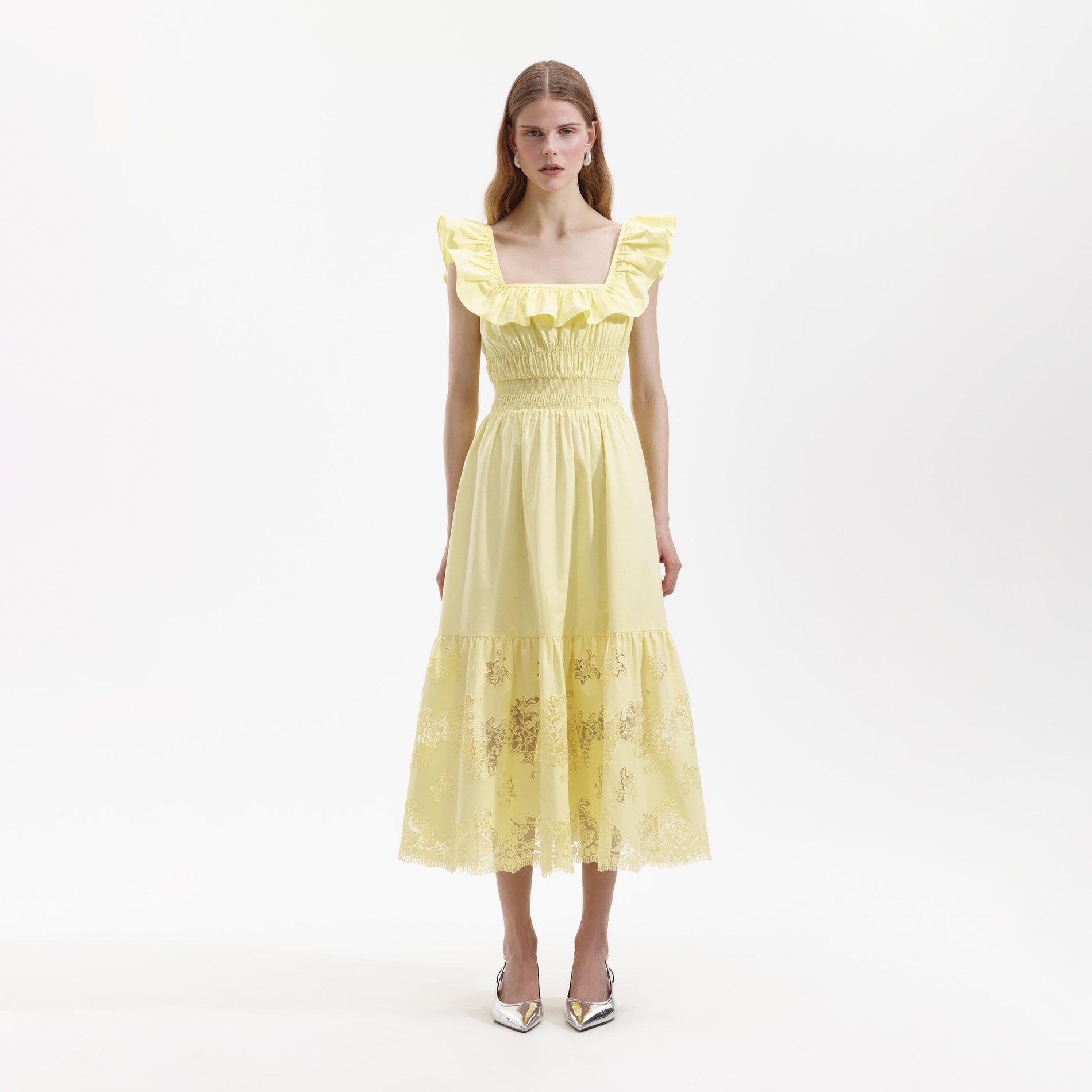 Front view of a woman wearing the Yellow Cotton Midi Dress