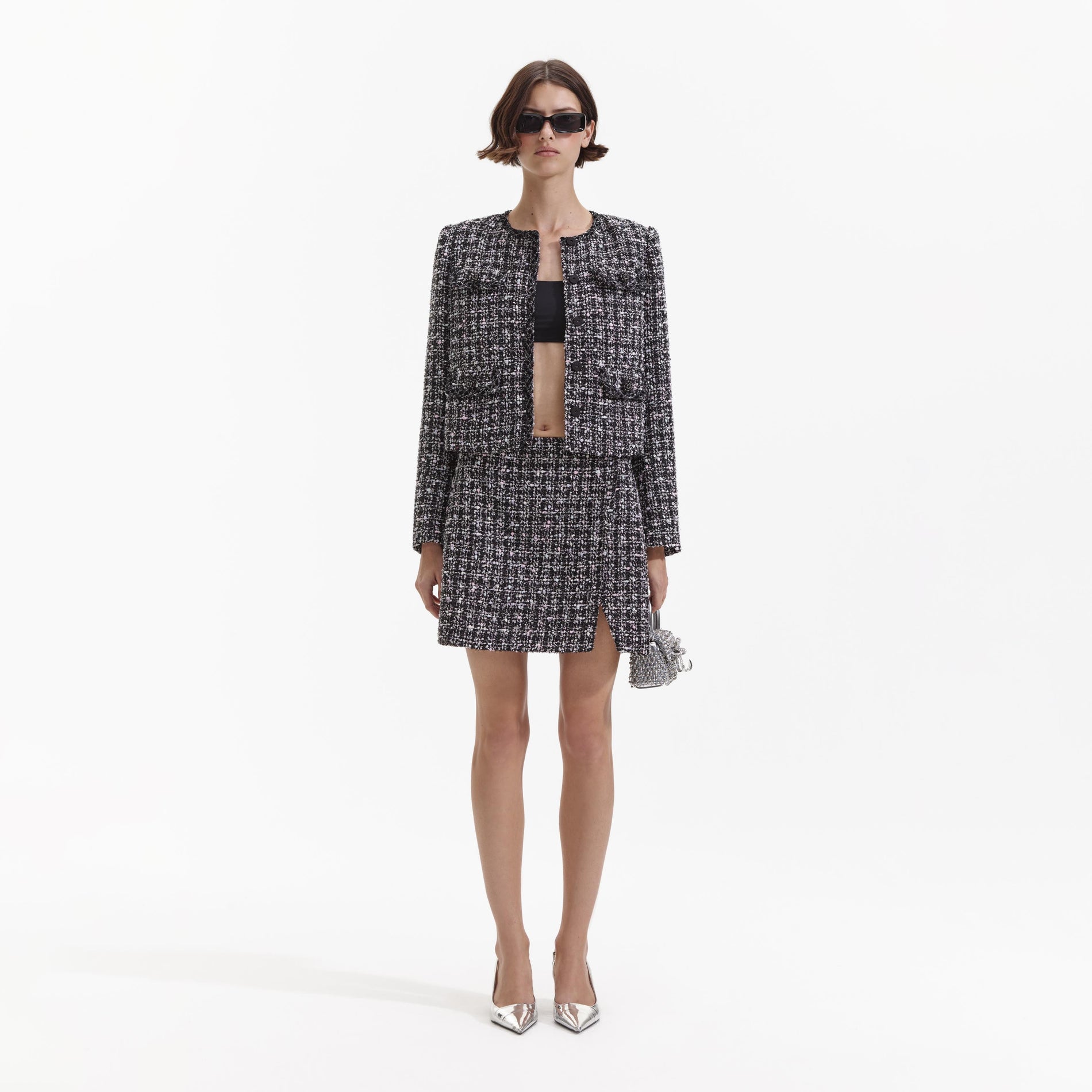 Front view of a woman wearing the Black Check Boucle Jacket