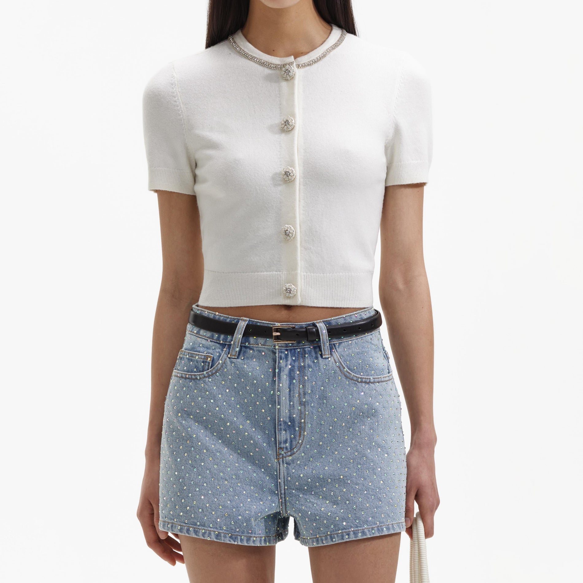 A close up of a woman wearing the Rhinestone Denim Regular Shorts