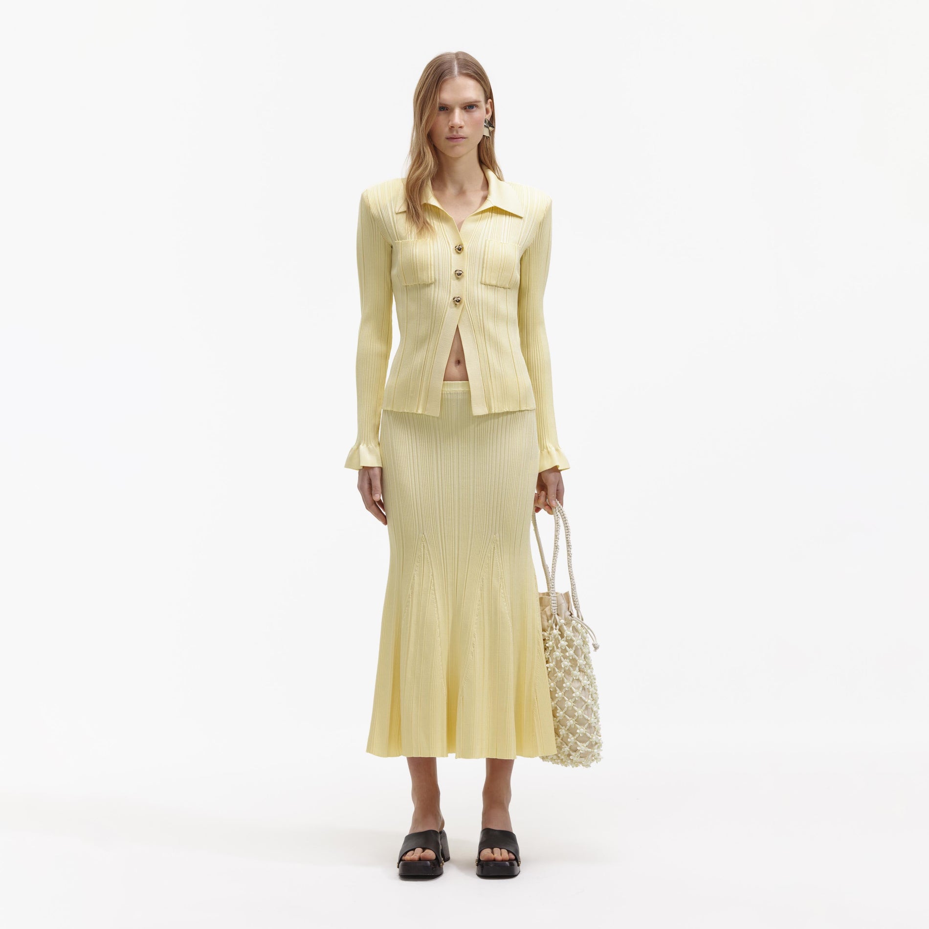 Front view of a woman wearing the Yellow Ribbed Viscose Knit Top