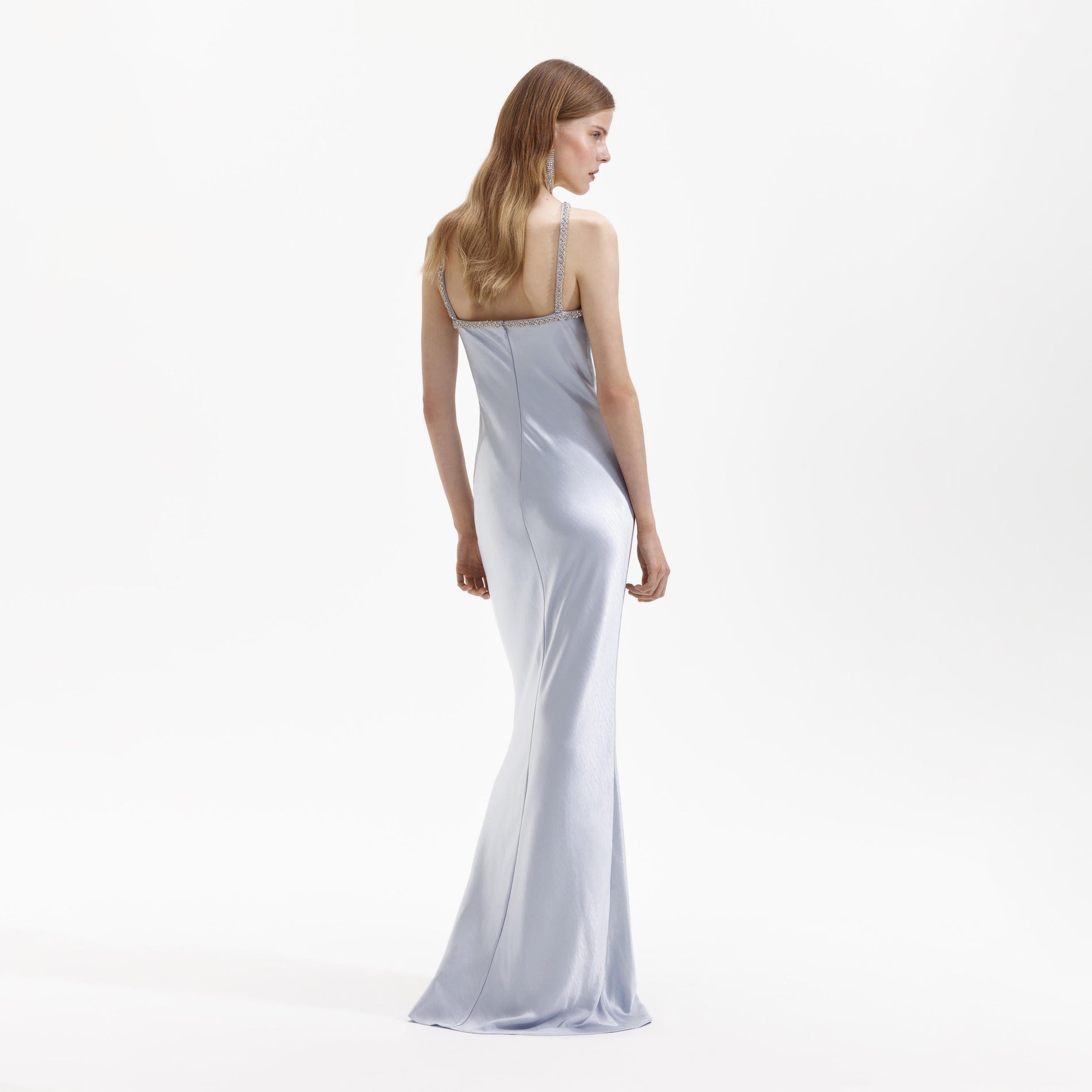 Back view of a woman wearing the Blue Satin Diamante Maxi Dress