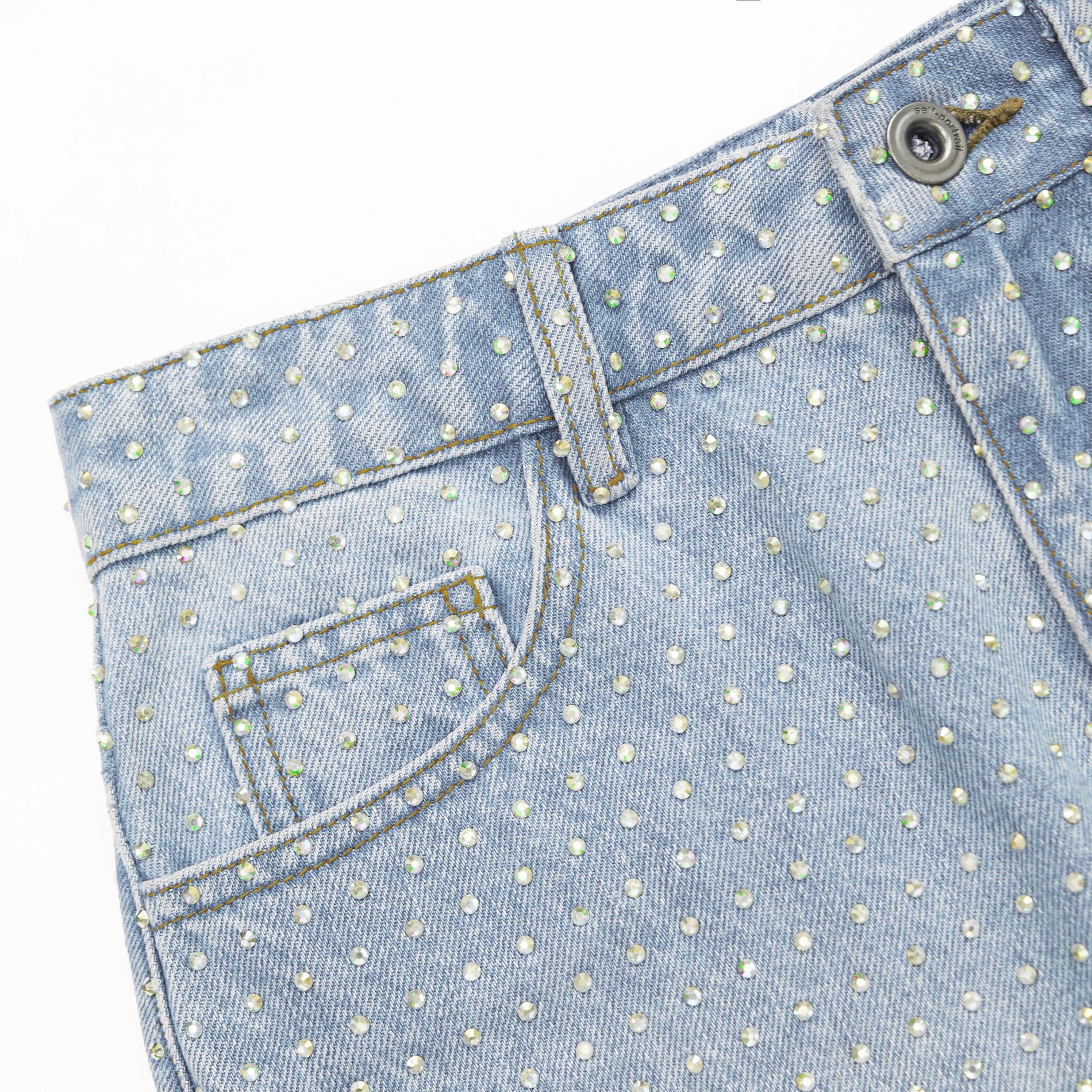 Fabric detail shot of the Rhinestone Denim Shorts