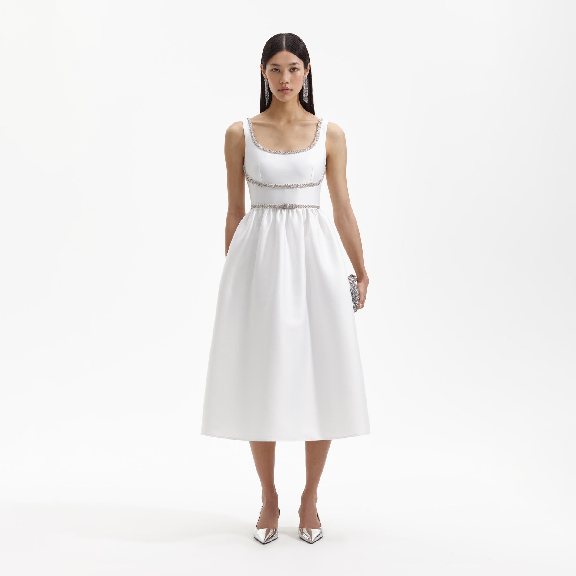 Front view of a woman wearing the White Taffeta Diamante Bow Midi Dress