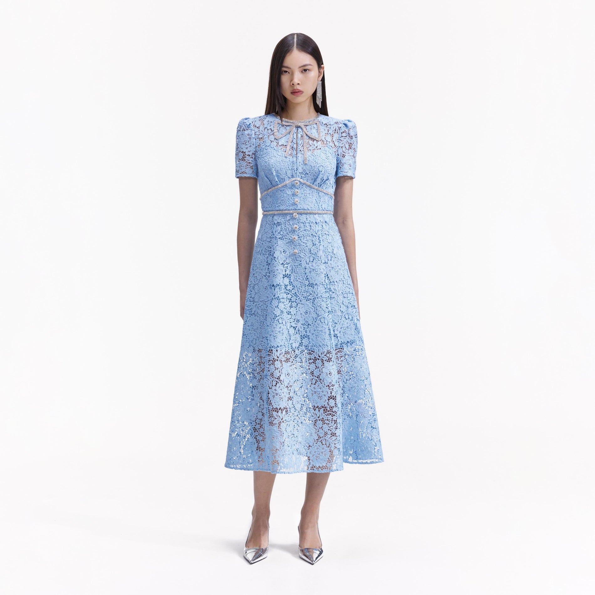 Front view of a woman wearing the Blue Cord Lace Bow Midi Dress