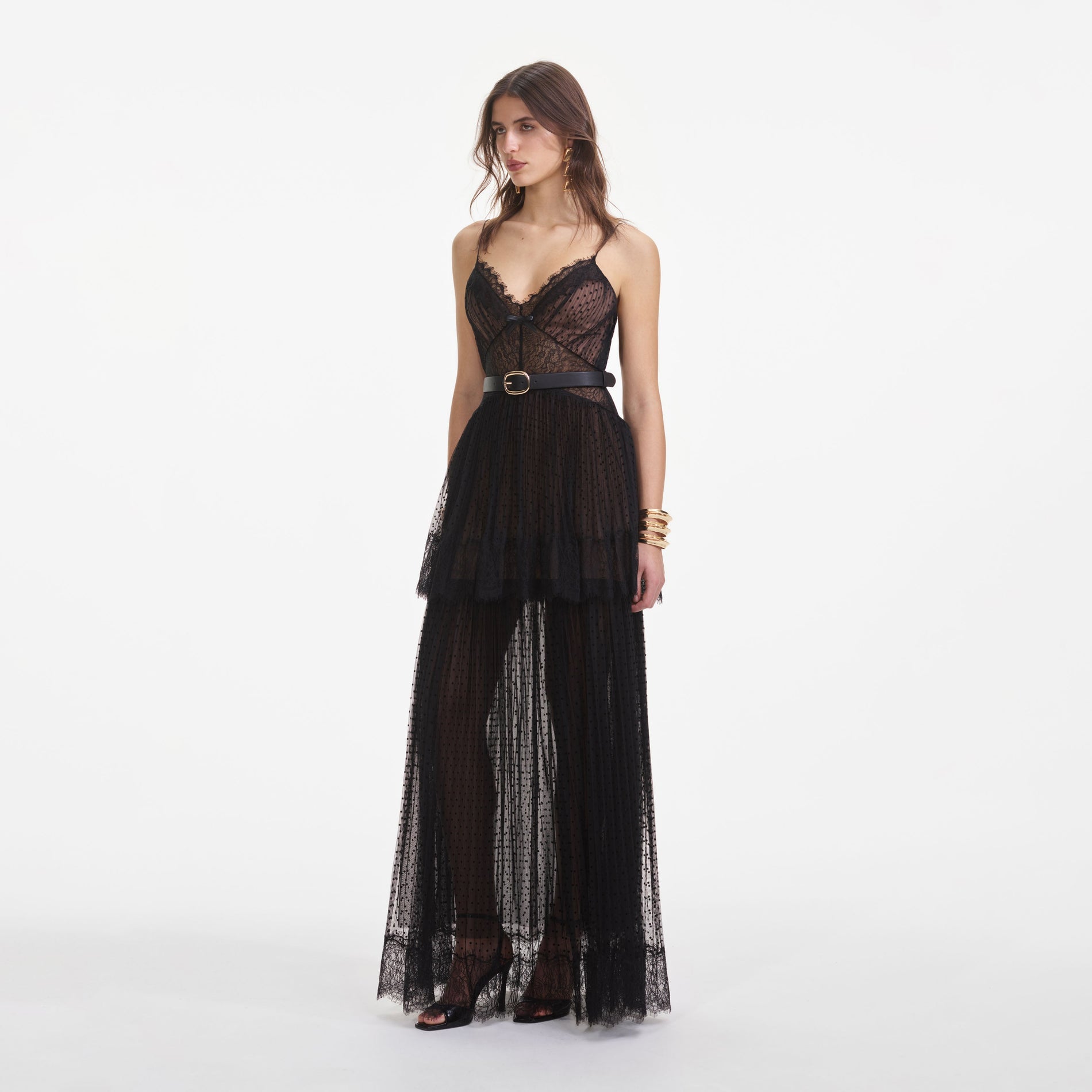 Side view of a woman wearing the Black Dot Mesh Tiered Maxi Dress