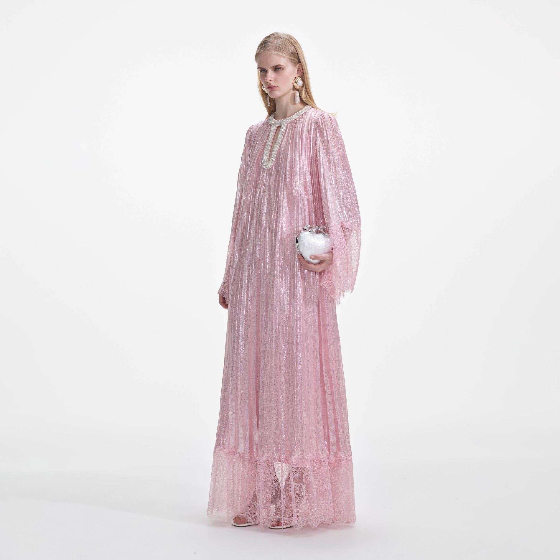 Back view of a woman wearing the Pink Metallic Pearl Maxi Dress