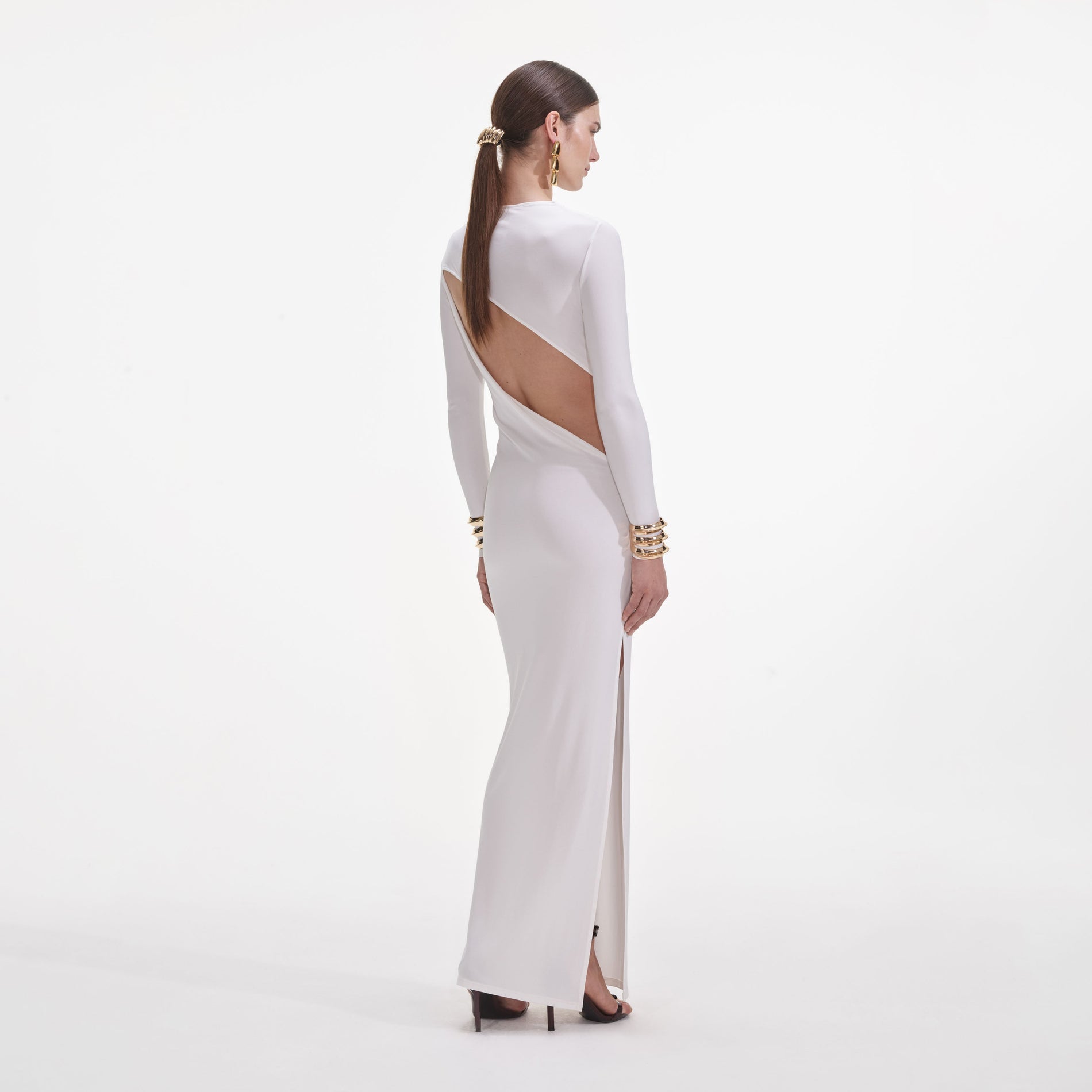 Back view of a woman wearing the White Jersey Gathered Midi Dress