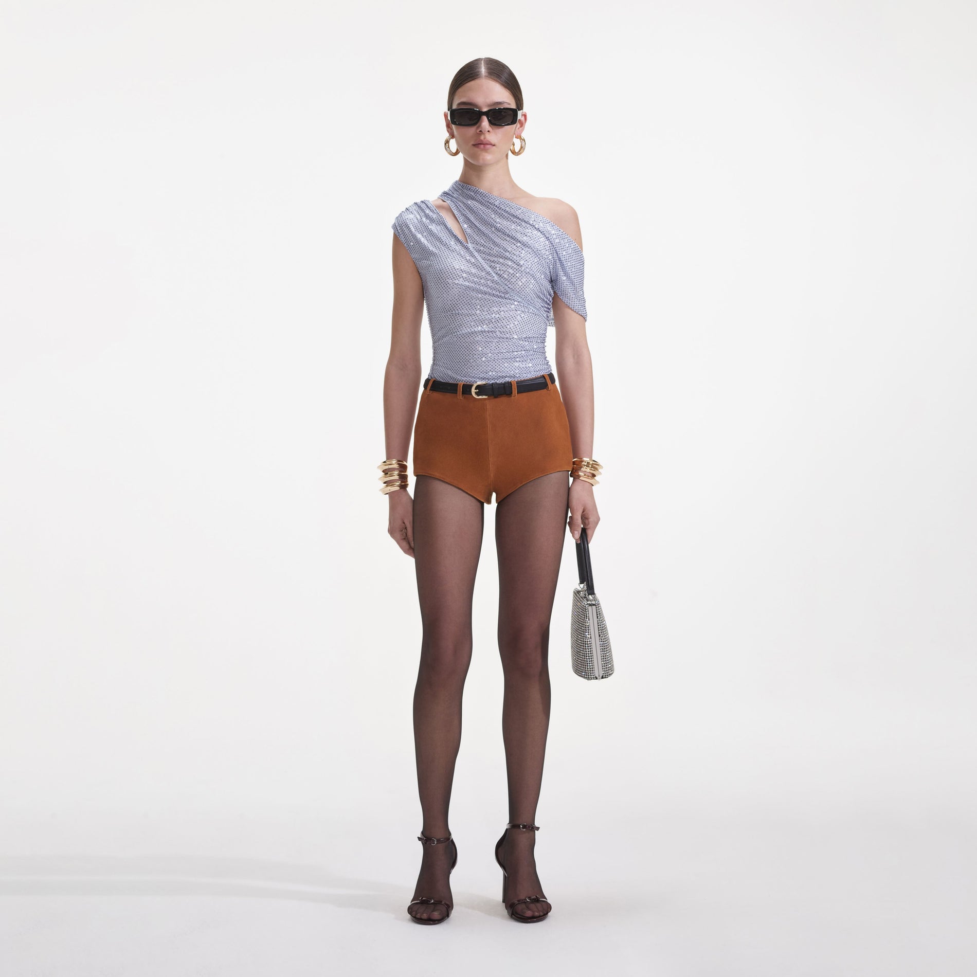 Front view of a woman wearing the Pale Blue Rhinestone Top