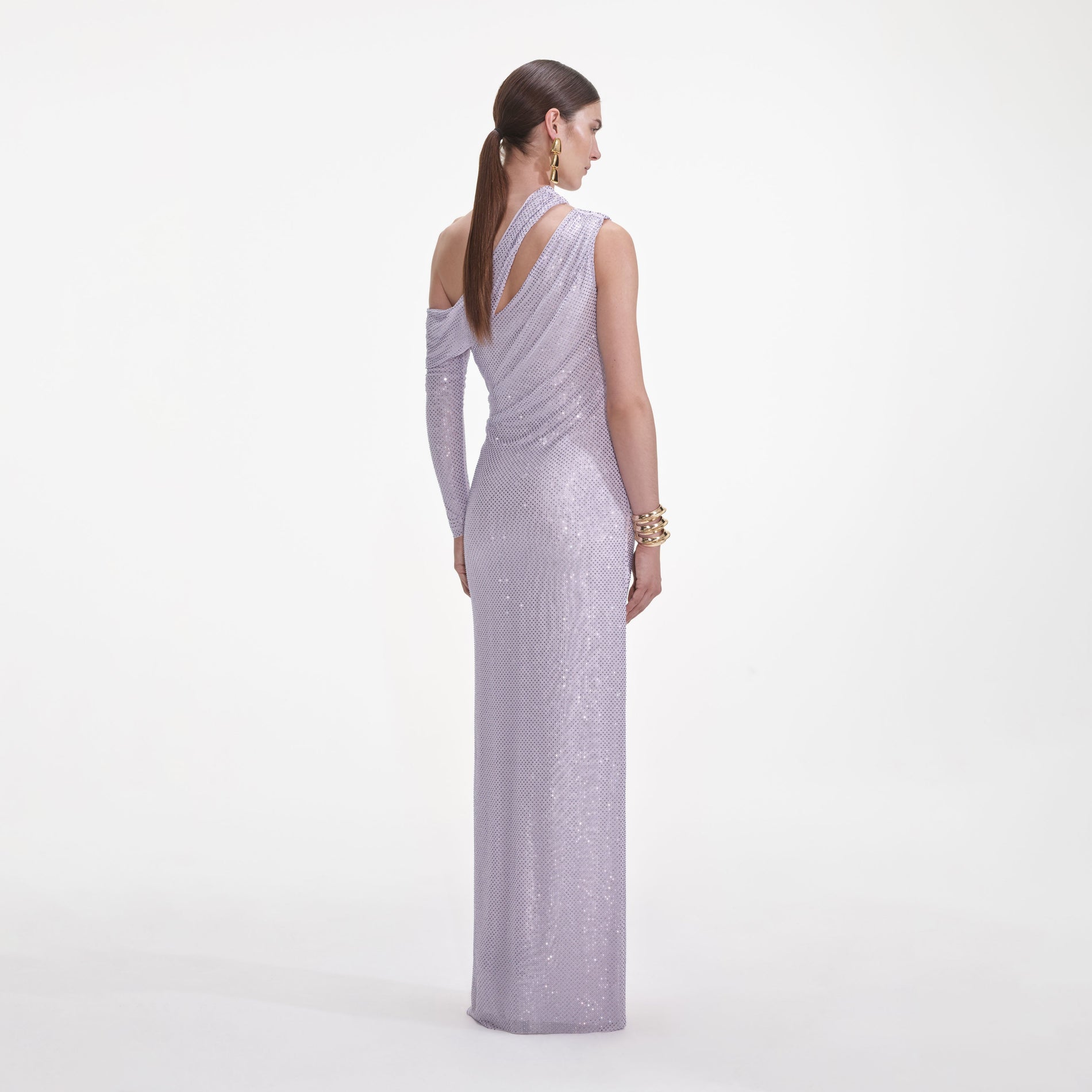 Back view of a woman wearing the Lilac Rhinestone Gathered Maxi Dress