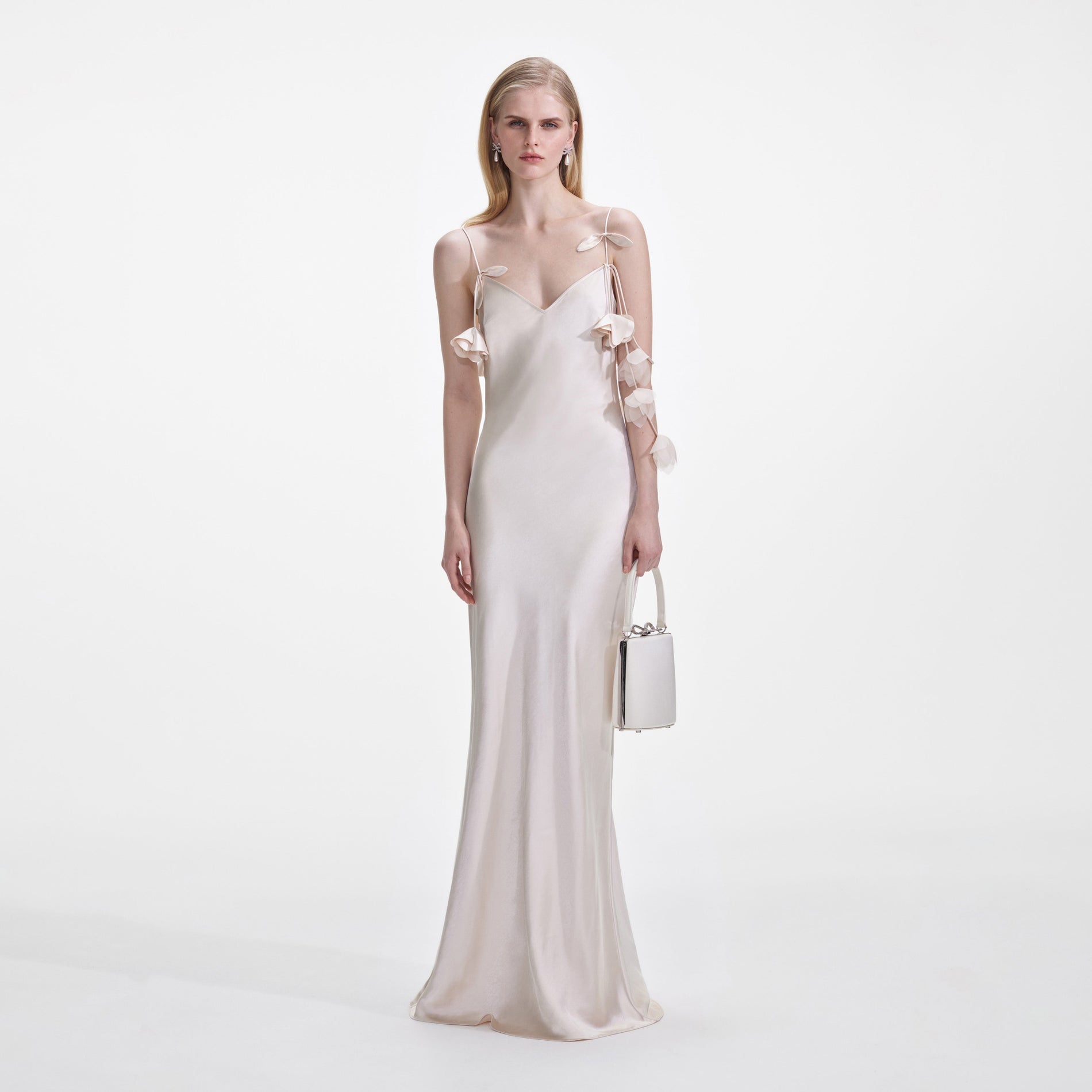 Front view of a woman wearing the Champagne Flower Satin Maxi Dress