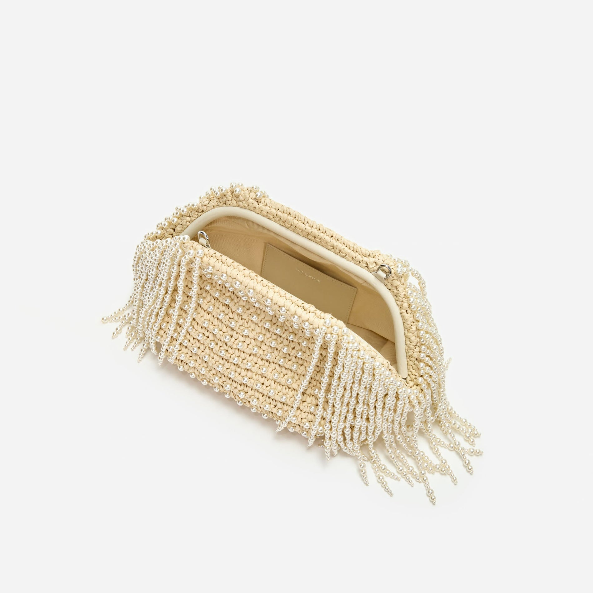 A photo of the Raffia Pearl Fringe Clutch