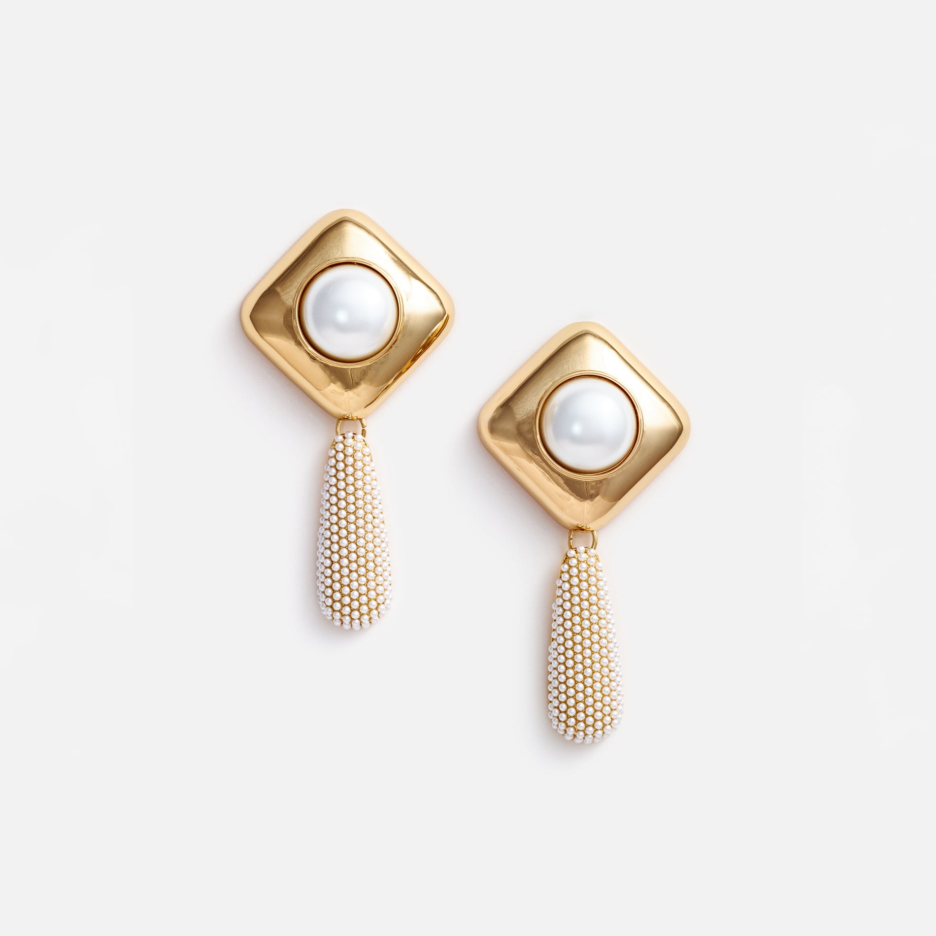 A photo of the Gold Pearl Crystal Bar Earrings