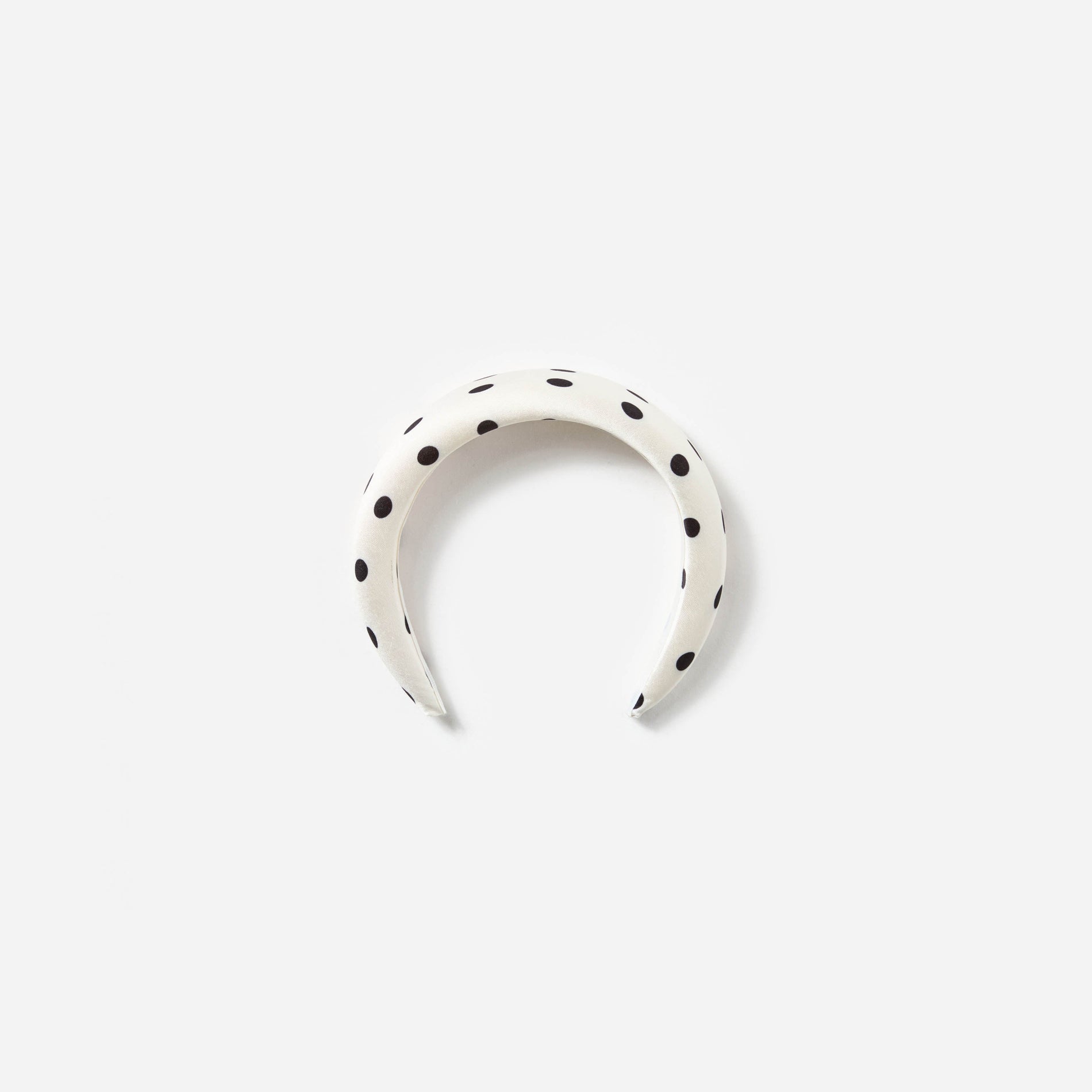 A photo of the Cream Polka Dot Headband