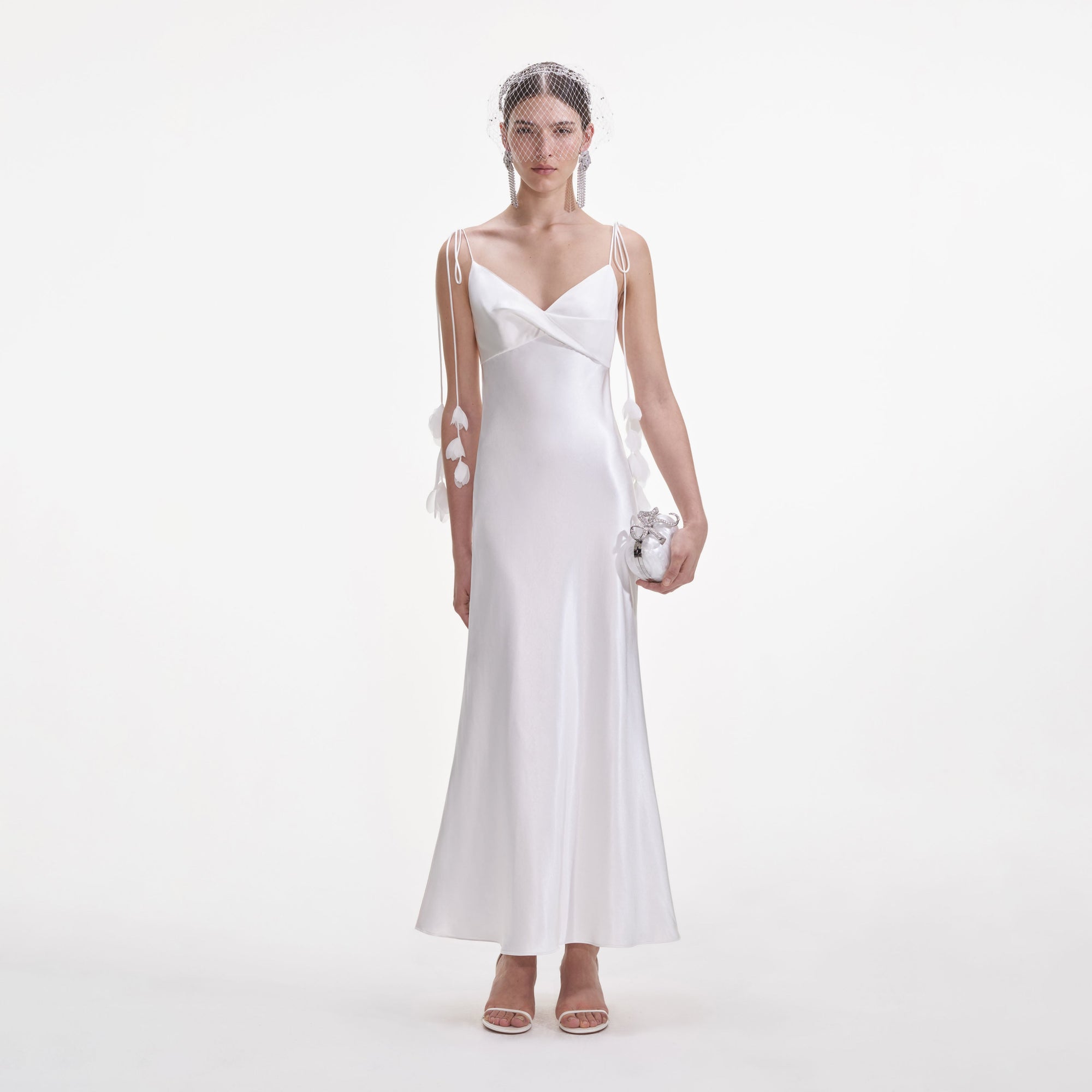 Front view of a woman wearing the White Satin Flower Midi Dress