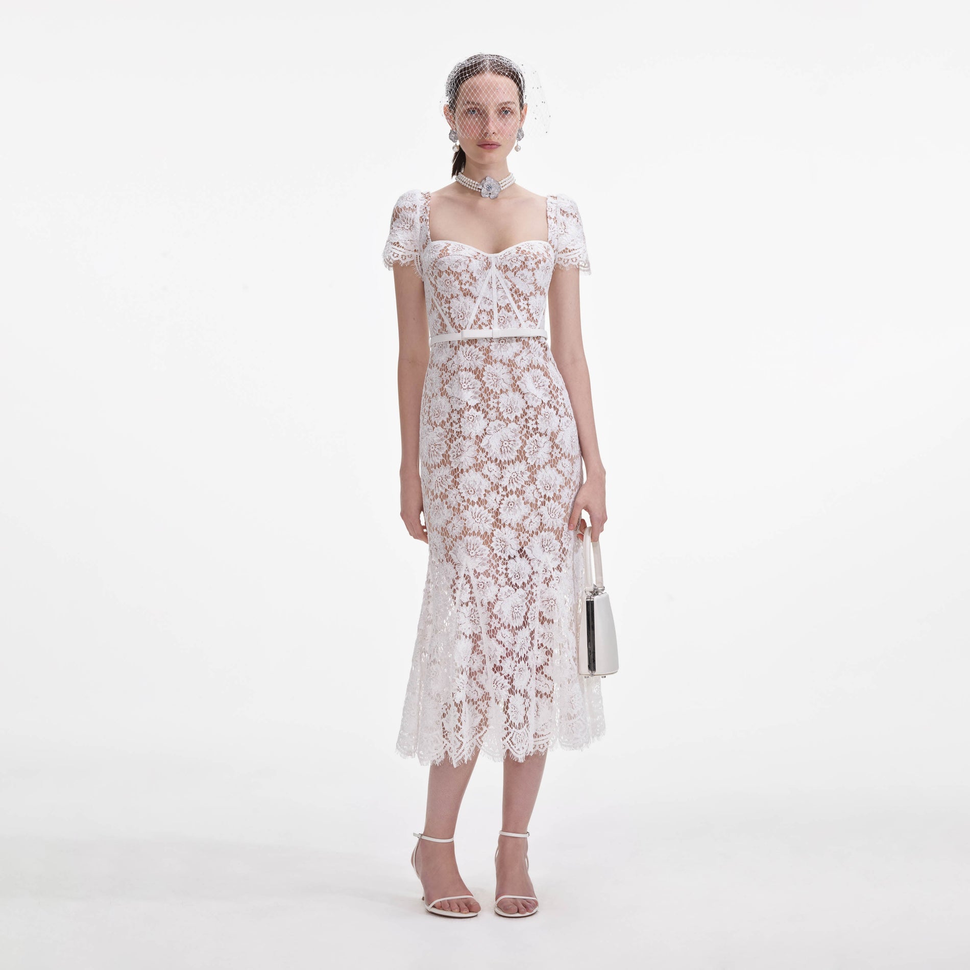 Front view of a woman wearing the White Fine Lace Midi Dress